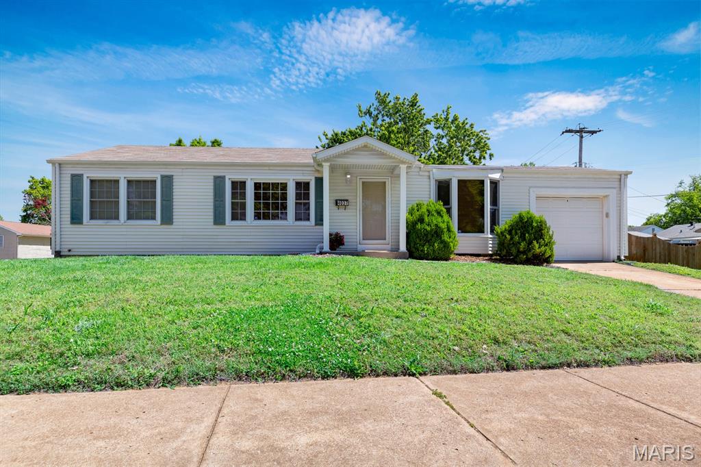 Charming 3 bedroom, 1 bath home in Boulevard Heights featuring a brand new partially finished basement, attached 1 car garage, and a spacious deck overlooking a fenced side yard. Situated on a desirable corner lot, this home offers a freshly painted interior, vaulted ceiling in the dining room, and an open kitchen/dining/living room combo perfect for entertaining. Major updates include a brand new roof and new sewer stack for added peace of mind. Washer and dryer stay with the home, making this move-in-ready property an even better value! Buyer to verify all MLS data.