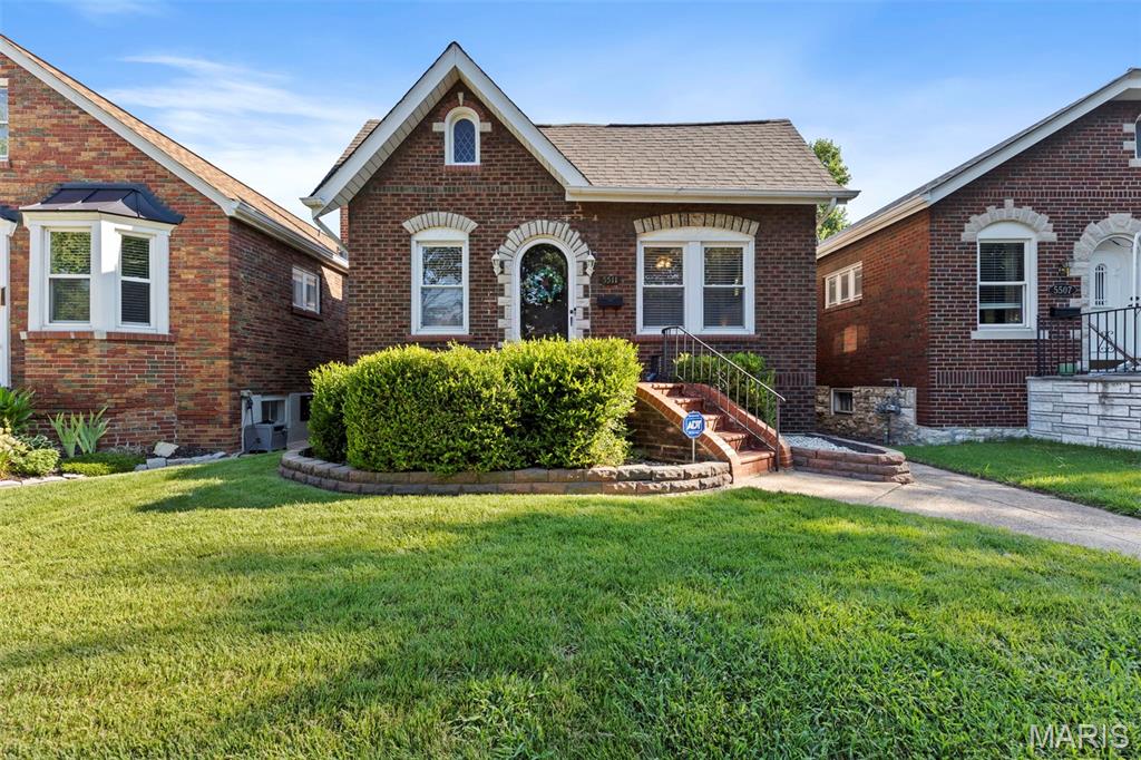 Welcome to 5511 Nottingham… where the curb appeal alone could lure Hansel & Gretel off the trail. Tucked into the heart of sought-after SoHa, just blocks from Macklind, this storybook 2 bed, 2 bath gingerbread charm is equal parts timeless, whimsical + wonderfully maintained. With established landscaping, a darling front porch + a lush green lawn, this is the kind of home that makes you slow down while driving by. Inside, you’ll find all the details that make these South City classics so beloved: original dark wood trim, stunning hardwood floors, crown moulding, stained glass windows + a charming gingerbread-style archway. The kitchen offers timeless oak cabinetry, generous counter space, space for a movable center island + plenty of room to decorate cookies… or a gingerbread house worthy of first place. Through the back, you’ll discover one of the home’s *sweetest* surprises… a beautifully remodeled four seasons room complete with heating + air. With its sloped ceilings, paned windows + new flooring, it feels like the kind of cozy hideaway you'd stumble upon in a storybook... just with much better Wi-Fi ;) The primary bedroom continues the storybook charm with more stained glass, rich woodwork + an oversized closet. A second bedroom + full bath, complete with subway tile + might just be the linen closet of your dreams, round out the upper level. Downstairs, you’ll find a partially finished basement that’s refreshingly witch-free, featuring a cozy guest suite, full bath, laundry room + a flexible space for a home office, playroom, workout room or overnight guests. Outside invites you to an oversized patio, fully fenced backyard, detached garage + plenty of room for gardening, entertaining or hanging bistro lights under the stars. And unlike some fairy tales, this one comes with a happy ending. The heavy hitters have already been taken care of, including a new A/C, garage door, washer & dryer, resurfaced tub, remodeled four seasons room + fresh paint, all completed in 2020. Just minutes from Francis Park, Salt + Smoke, Macklind’s local favorites like Russell’s + neighbors who still wave on their evening walks… this is one storybook you’ll want to call your own. Cheers!