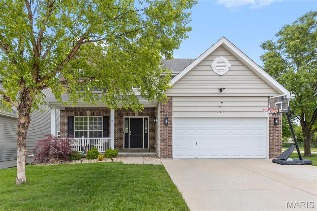 Welcome to this beautifully updated 2-story home in the highly sought-after Wyndgate subdivision in Lake St. Louis and located in the desirable Liberty attendance area! Offering an open floor plan, 9’ ceilings on the main level, and abundant natural light, this home perfectly blends functionality and style. Step into the inviting foyer flanked by a formal sitting room and flowing into the dining room and spacious living room featuring a cozy gas fireplace. The heart of the home is the updated kitchen showcasing new quartz countertops, updated appliances, center island with bar seating, recessed lighting, and seamless connection to the breakfast room—ideal for both everyday living and entertaining. Step outside to enjoy the composite deck overlooking the backyard with stairs leading to an additional patio space and private swim spa below—perfect for relaxing or entertaining. Convenient main floor laundry and half bath complete the main level. Upstairs you’ll find 4 spacious bedrooms, all with walk-in closets, including a vaulted primary suite featuring a spa-like bath with soaking tub, walk-in shower, and oversized double vanity. Brand-new carpet extends throughout the entire second floor. The finished walkout lower level offers incredible additional living space with a large family/rec room, full bath, bonus room, and recessed lighting throughout. Additional features include a new roof, sprinkler system, and attached 2-car garage. Enjoy all the amenities Wyndgate has to offer including a community pool, clubhouse, pickleball and basketball courts, and playgrounds—all in an amazing Lake St. Louis location!