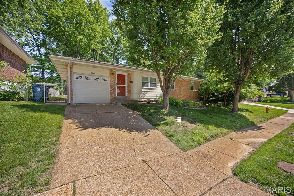 Tucked away on a quiet cul-de-sac street in the heart of Affton, this charming 3 bed, 2 bath home offers the perfect blend of comfort, updates, and outdoor living! Step inside to find an open floor plan with beautiful hardwood floors, built-in shelving and storage, and an updated bathroom that adds a fresh modern touch. Thoughtful improvements throughout, including updated electrical, add extra value and peace of mind, while the finished basement offers additional living space perfect for entertaining, relaxing, or a home office setup. Outside, the large flat fenced backyard is truly a standout feature! Complete with a shed, working built-in gas grill, and a private gate with direct access to Mathilda Welmering Park. Whether you're hosting gatherings, enjoying quiet evenings, or taking advantage of the nearby green space, this backyard is made to be enjoyed. A 1-car garage and unbeatable location on a peaceful street make this Affton gem one you won’t want to miss!