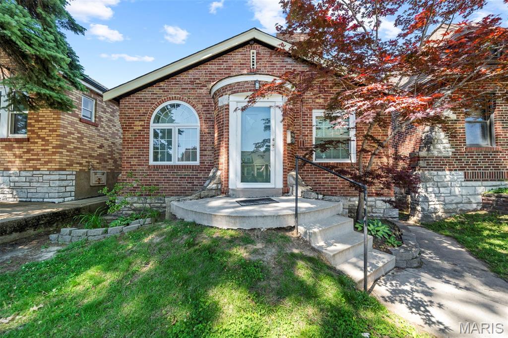 Charming 2 bedroom 1 bath Southampton brick bungalow blending timeless character with thoughtful updates in one of South City’s most desirable neighborhoods. Step inside to find beautiful hardwood floors, abundant natural light, and original stained glass windows that preserve the home’s historic charm. The spacious living and dining areas create an inviting layout for everyday living and entertaining. The updated kitchen offers modern convenience while maintaining the home’s character, and two comfortable bedrooms plus an updated bath complete the main level. The clean lower level provides excellent storage or future finishing potential. Outside, enjoy a private backyard, garage parking, and an unbeatable location just minutes from Macklind restaurants, local shops, parks, and everything Southampton has to offer! Come schedule you showing today!