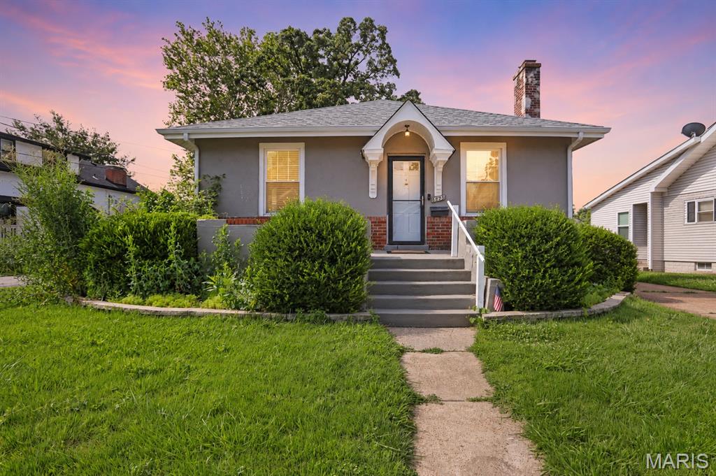 Welcome to this charming bungalow in the heart of Brentwood, where timeless character meets thoughtful updates and modern convenience. Step inside to discover beautiful new luxury vinyl plank flooring that flows throughout the main level, creating a warm and cohesive feel. The spacious living room is filled with natural light and anchored by a charming fireplace, making it the perfect place to gather with family and friends or simply unwind after a long day.

The living room opens seamlessly into the dining area, offering an ideal layout for entertaining and everyday living. Just beyond, the updated eat-in kitchen features white cabinetry, granite countertops and abundant cabinet storage. Off the kitchen, you'll find a bright and versatile sunroom that serves as the perfect extension of the home. Whether used as a sitting room, reading nook, playroom, home office, or morning coffee retreat, this space offers endless possibilities and overlooks the backyard.

The main level also features two generously sized bedrooms with ample closet space and an updated full hall bath complete with modern fixtures, stylish finishes, and a beautifully tiled shower/tub combination. Downstairs, the partially finished walk-up lower level provides valuable additional living space with a spacious recreation room perfect for movie nights, a game room, workout area, or second living room. An additional bonus room offers flexibility for a home office, hobby room, guest space, or play area. A full bathroom with a shower on the lower level adds even more convenience and functionality.

Step outside to enjoy the level, fenced backyard, offering plenty of room for pets, play, gardening, or outdoor entertaining. The detached two-car garage provides convenient off-street parking, additional storage, and space for tools or hobbies.

Location is key, with easy access to Brentwood's popular shopping, dining, parks, and everyday conveniences, along with quick access to major highways for an easy commute throughout the St. Louis area. Combining classic charm with modern updates and flexible living space, this move-in ready home offers the perfect place to call home.