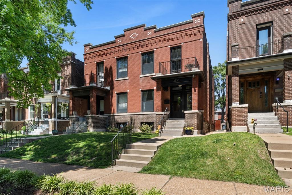 Experience the perfect blend of historic character and modern convenience in this beautifully renovated townhome located in the heart of vibrant Tower Grove South. Just moments from Tower Grove Park, South Grand dining, Hartford Coffee, farmers markets, and neighborhood favorites, this 3-bedroom, 2.5-bath home offers the ideal urban lifestyle with approximately 1,860 square feet of thoughtfully designed living space. The main level features expansive living and dining areas filled with natural light and architectural charm, creating an inviting setting for both everyday living and entertaining. The updated kitchen is designed for gathering, complete with natural stone countertops, center island, breakfast area, and stainless Frigidaire appliances. Upstairs, the spacious primary suite offers a walk-in closet and private full bath, while two additional bedrooms provide flexibility for guests, office space, or additional living needs. Historic details continue throughout the upper level, including vintage windows, an original built-in cupboard, and a stunning Jeffersonian window in the front bedroom that opens to a balcony overlooking the tree-lined street below. The lower level offers excellent future potential for additional finished living space with tall ceilings and a dry environment ideal for a recreation room, home gym, media space, or additional storage. Outdoor living is equally appealing with a private fenced backyard, oversized one-car garage, rebuilt front porch (2022), and pebble-coated rear porch completed in 2021. Additional improvements include tuckpointing throughout and well-maintained major systems. Combining the charm of a historic renovation with modern amenities and an unbeatable Tower Grove South location, this move-in ready home is a rare opportunity to enjoy city living at its best.