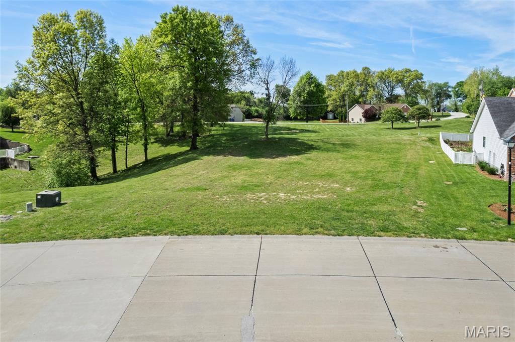 FINAL OPPORTUNITY. Great lot in Established neighborhood in Francis Howell Schools. Lot is nearly a quarter of an acre, allowing you to build your custom home. Parcel already has all utilities on site. The Neighborhood Pearl Ridge features custom built homes ranging above $750,000.00 in value. Parcel is just minutes from Hwy 364 and Upper Bottom road, allowing ease of Convenience.