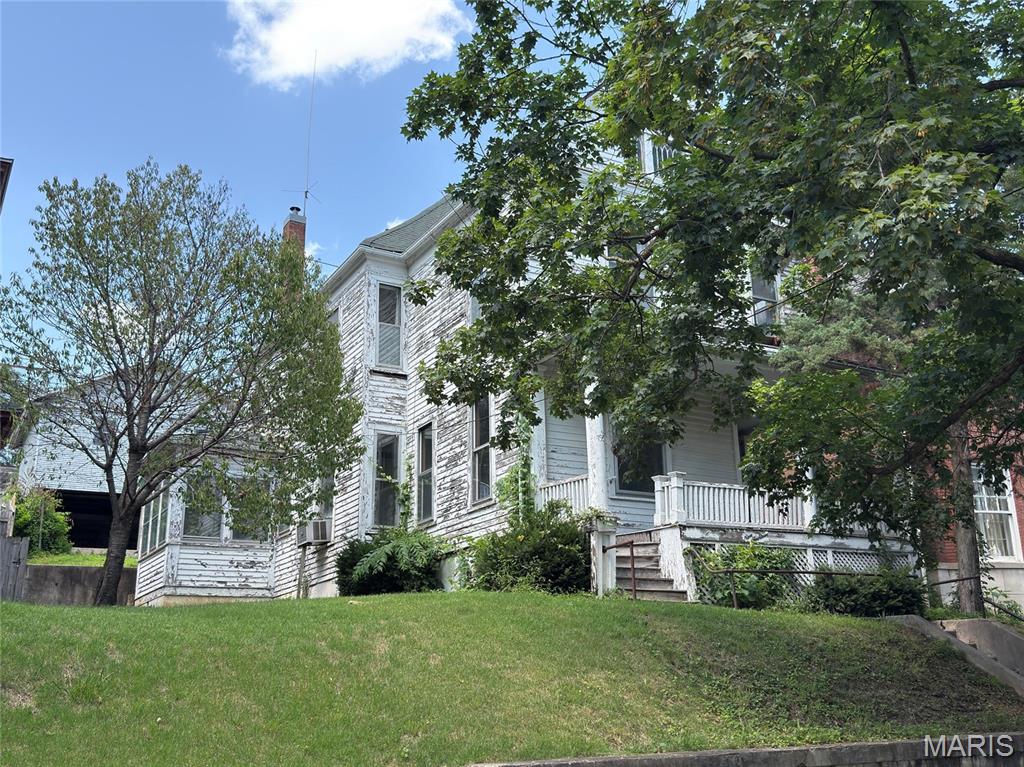 Historic Home Lovers take Note!!  This home was built in 1906 and offers an abundance of historic charm.  Listed in the Maple Avenue Historic District, this property is Currently set up as a duplex with separate entrances to each unit.  You will love the hardwood floors evident in the walk-in closets and throughout the upstairs unit.  Crown molding on the main level and French doors separating rooms offer a historic feel.