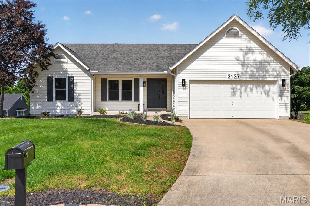*BACK ON MARKET NO FAULT OF SELLER!* Beautifully updated 4-bedroom, 3 full bath home in the heart of O'Fallon offering the perfect blend of comfort, space, and versatility on an oversized cul-de-sac lot. This home features a finished lower level complete with a kitchenette, creating an ideal setup for multi-generational living, guest quarters, or private apartment-style living. The main level offers warm, inviting living spaces with plenty of room for everyday living and entertaining, while the brand new deck overlooking the backyard provides the perfect place to relax or host gatherings. Major updates include a 2-year-old roof, HVAC approximately 3 years old, and appliances just 1 year old, giving buyers added peace of mind. Conveniently located near shopping, dining, parks, and schools, this move-in ready home combines flexibility, comfort, and convenience!