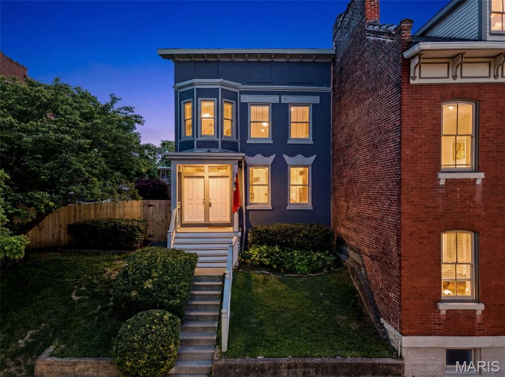 Historic Benton Park charm meets modern updates in over 2,500 square feet with 3 bedrooms,
2 1/2 bath, on a rare double lot in one of St. Louis’ most walkable neighborhoods.
The two separately deeded parcels give you a rare massive outdoor footprint right now with the
option to build later or sell the vacant lot when the time is right.

Originally built in 1903 and gut-renovated in 2001, the home preserves its historic character
while incorporating updated systems throughout. Features include hardwood floors, custom
millwork, six-panel wood doors, and Marvin windows. Major updates include modern electrical
with a 200-amp panel, updated plumbing, high-efficiency water heater, copper main water line,
updated sewer line, and zoned HVAC. HVAC systems were both replaced within the last five
years.

For those who cook, this kitchen is the real deal. Custom cabinetry, concrete countertops, 36"
cooktop with hood, double ovens, center island, and walk-in pantry. Hardwood floors throughout
the main level, convenient half bath off the side, with first-floor laundry hookups available as
well.

Upstairs, the spacious primary suite exceeds expectations for city living. The bedroom features
a private balcony, a walk-in-closet + laundry room combo, along with a bathroom featuring a
double vanity, jetted tub, and separate shower. The second floor features another bedroom and
full bath, plus a bonus living space! The quaint bay window makes for a great reading nook,
office, or room to play, but could easily be converted to a 3rd bedroom.

The outdoor space is equally impressive, a brick paver patio with mature landscaping, and six-
foot wooden privacy fence. The additional lot provides rare outdoor space in the city, along with

alley access and parking for two vehicles, and a perfect golf cart pad.
Conveniently located near Benton Park, Fremont Dog Park, Gus' Pretzels, Venice Cafe, and
Frazer's Restaurant and Lounge, with easy highway access, this home offers a unique
opportunity to enjoy space, character, and convenience in one of St. Louis’ most sought-after
neighborhoods.

More land, more house, more possibilities all in the heart of Benton Park!