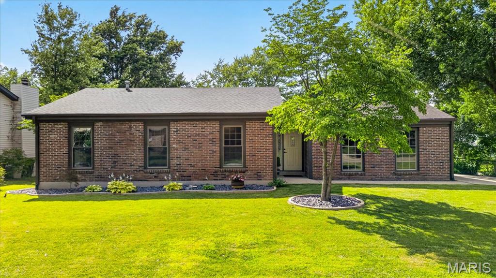 Beautifully renovated home situated on a desirable corner lot in a prime St. Peters location close to shopping, dining, entertainment, and major highways. This 3-bedroom, 2-bath residence offers exceptional curb appeal with a spacious, professionally landscaped front yard filled with colorful seasonal flowers.

Inside, the home has been fully transformed with modern updates throughout. The stunning new kitchen features two-tone cabinetry, quartz countertops, and a clean, contemporary design ideal for both everyday living and entertaining. Both bathrooms have been updated with stylish, modern finishes.

Extensive upgrades provide peace of mind, including a new HVAC system, new electrical panel and wiring, new hot water heater, new laminate flooring, and new carpet throughout. 

The home also features a partially finished walk-out basement offering additional flexibility and living space. Exterior highlights include a classic brick facade, a large composite deck perfect for outdoor enjoyment, and a 2-car garage with an expanded driveway. 

Located in sought-after St. Charles school district, this turnkey home combines modern upgrades, functional living, and an unbeatable location.