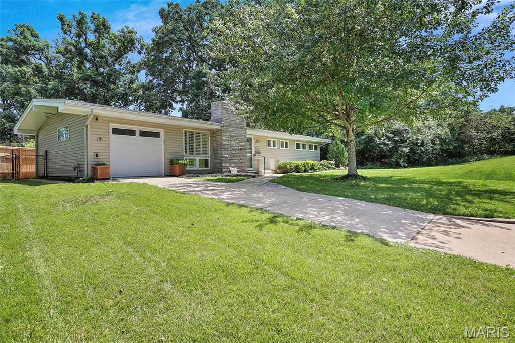 Welcome to this renovated take on Ralph Fournier's classic 3 Bed, 1 Bath home in the heart of Crestwood. This home blends modern updates with the mid-century charm which the neighborhood is known for. the redesigned kitchen layout with locally built custom cabinetry that maximizes it's space without loosing its open feel. Each bedroom has preserved their built-in closet design and offer flexibility for a variety of uses. The large corner lot has a sizable front yard with a one car garage and private back yard that is perfect for relaxing. Enjoy the comfort of move in ready experience with a new roof, water heater, and updated panel and windows. Make sure this home is on your list to see this weekend!