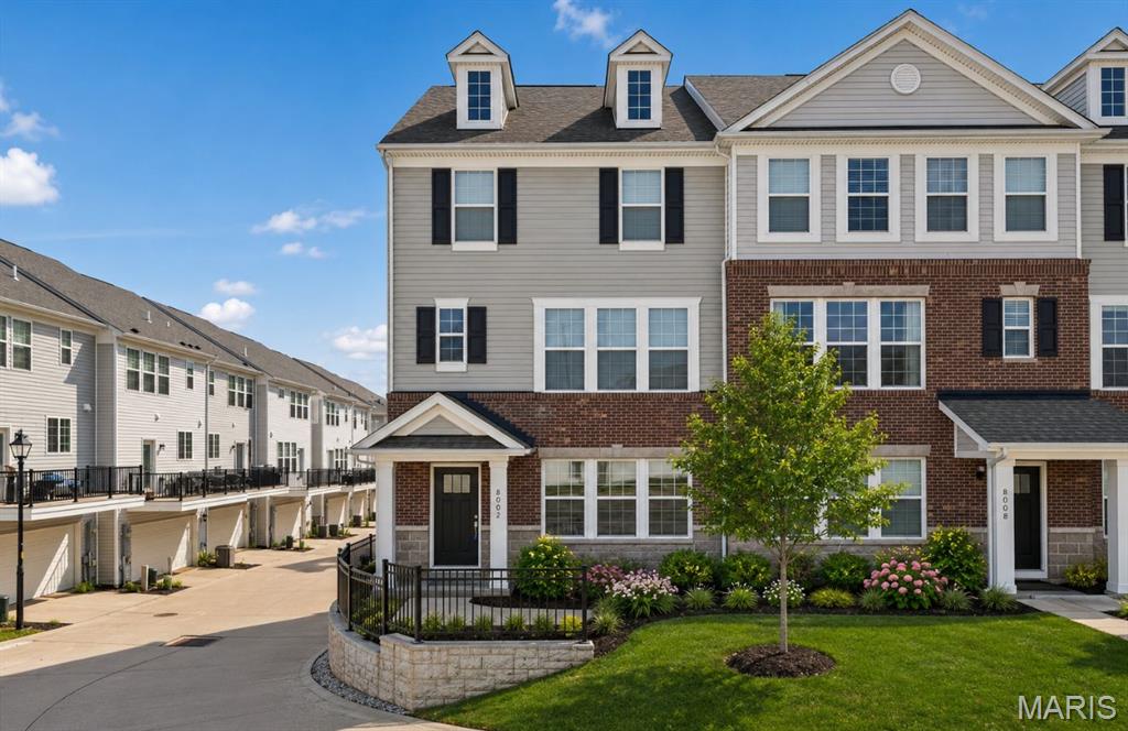 Welcome to upscale living in the highly sought-after Central Park Townes community, perfectly located within the Clayton School District. This vibrant neighborhood offers an easy, connected lifestyle just moments from everything Clayton has to offer.  This beautiful newer construction home features three levels of chic, thoughtfully designed living.  The entry level welcomes you with a bright and versatile office or family room, complete with a half bath and convenient access to the attached garage—perfect for today’s flexible lifestyle.  The main living level showcases an open floor plan ideal for both everyday living and entertaining. Enjoy a stunning cook’s kitchen with designer appliances, a spacious dining area, and a light-filled family room with oversized windows. A walk-out deck and charming office nook add even more function and appeal, along with an additional half bath.  Upstairs, the second floor offers a serene primary suite with a luxurious bathroom and walk-in closet. Two additional bedrooms, a full hall bath, generous closet space, and second-floor laundry complete this level with ease and convenience.  Beautifully appointed throughout, this home offers a truly low-maintenance, turn-key lifestyle.  Walk to restaurants, Shaw Park, and all of the shops, dining, and amenities that make Clayton one of St. Louis’s most desirable destinations.  Move right in and love where you live.