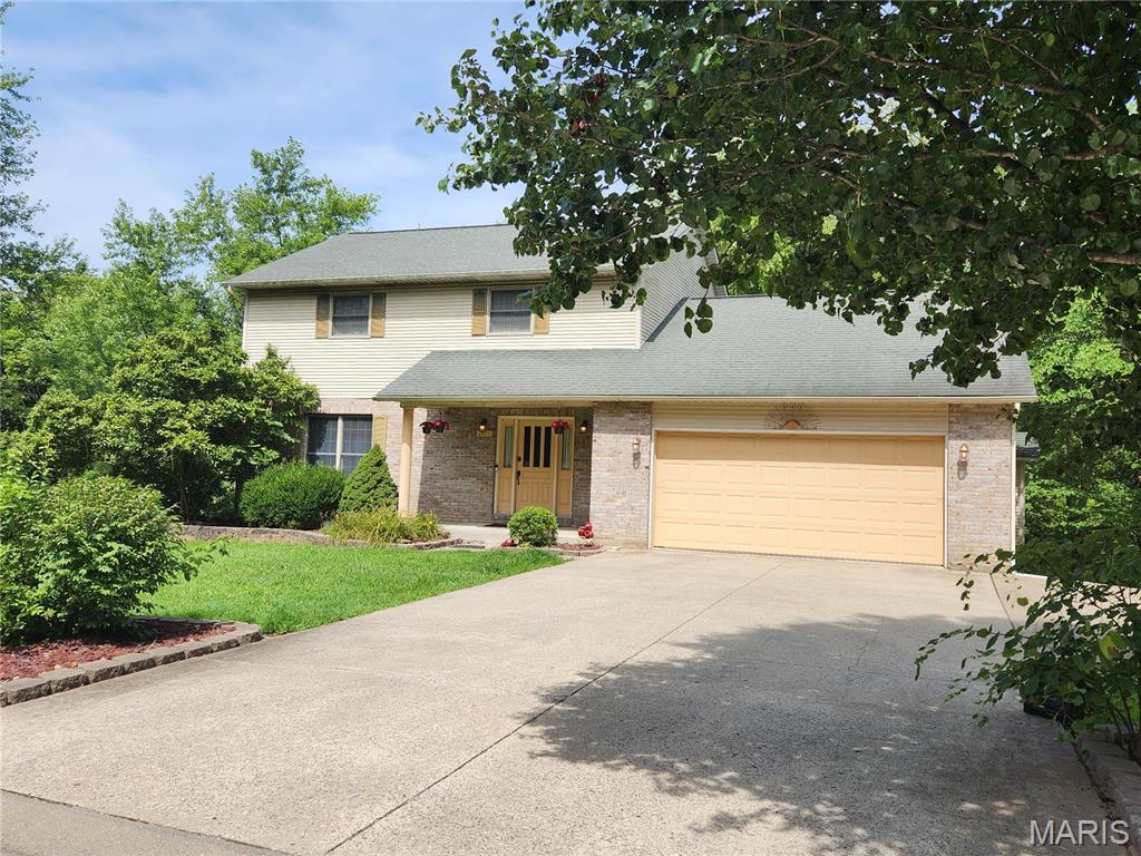 Welcome to 2405 Brittany Dr, located in the delightful Annwood Estates neighborhood. This listing is quite special as the current renovations are underway. The asking price reflects the anticipated finished product. As you approach the home, you'll instantly be drawn to its vibrant curb appeal, featuring lovely landscaping and an attractive 2-story design. The exterior will showcase new light fixtures, freshly painted shutters, and will be power washed for a clean look. Inside, the home currently offers 3 bedrooms and 2.5 bathrooms, but it will soon transform into a 5-bedroom, 3.5-bathroom residence. The main floor includes a living room, half bath, laundry room, kitchen, and family room, with access to a spacious multi-level deck that overlooks a serene creek. This level will boast all new flooring, baseboards, paint, cabinets, countertops, and appliances. Upstairs, you'll find 3 bedrooms and 2 bathrooms, all of which will also feature new flooring and paint. The master bedroom provides excellent storage with his and her closet spaces. The master bath's garden tub will be replaced with a custom walk-in shower. Additionally, the full, unfinished basement will soon be completed to include an extra family room, a full bathroom, a second laundry space, and two more bedrooms.
