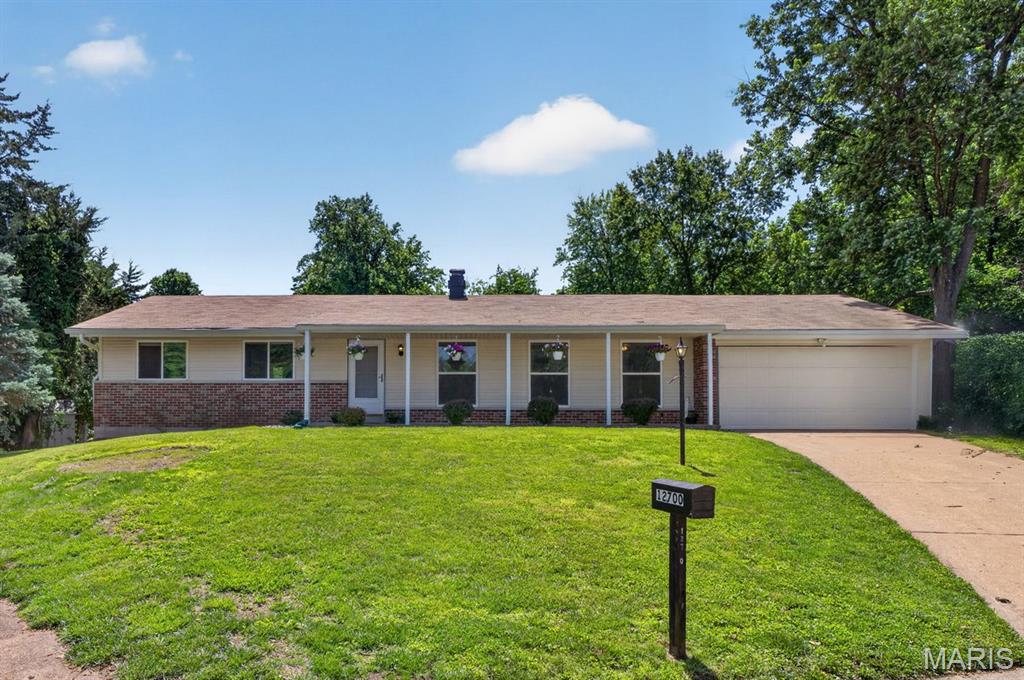 Pride of ownership shines throughout this beautifully updated ranch home offering over 3,142 sq ft of comfortable, functional living space. The open floor plan creates easy flow between rooms and fills the home with natural light and peaceful views.

Just off the spacious living room, an additional sitting area features a cozy gas fireplace, creating the perfect spot for relaxing, reading, or gathering with guests.

The updated kitchen includes granite countertops, porcelain tile backsplash, under-cabinet lighting, custom cabinetry with brushed-nickel hardware, stainless steel appliances (including a new dishwasher and new stainless refrigerator that stay), and a quartzite island ideal for meal prep and casual seating.

Oak hardwood flooring, fresh paint, updated lighting, thermal tilt-in windows, modern hardware, and beautifully refreshed baths add to the home’s charm and convenience.

This home offers two laundry options — a main-floor laundry area for everyday ease and a finished laundry space in the lower level, giving buyers flexibility and added functionality.

The spacious lower level provides even more living space — perfect for an office, den, recreation room, hobby area, or guest suite — and walks out to a second patio through sliding glass doors.

Step outside to your own private retreat: a large patio, built-in charcoal grill/fire pit, and a fenced, level, park-like yard just shy of a half-acre. Quiet, peaceful, and surrounded by nature, with deer often visiting this cul-de-sac setting.

Additional features include a sunroom, parking for up to 6 cars, and a 2-10 Home Warranty for added peace of mind.