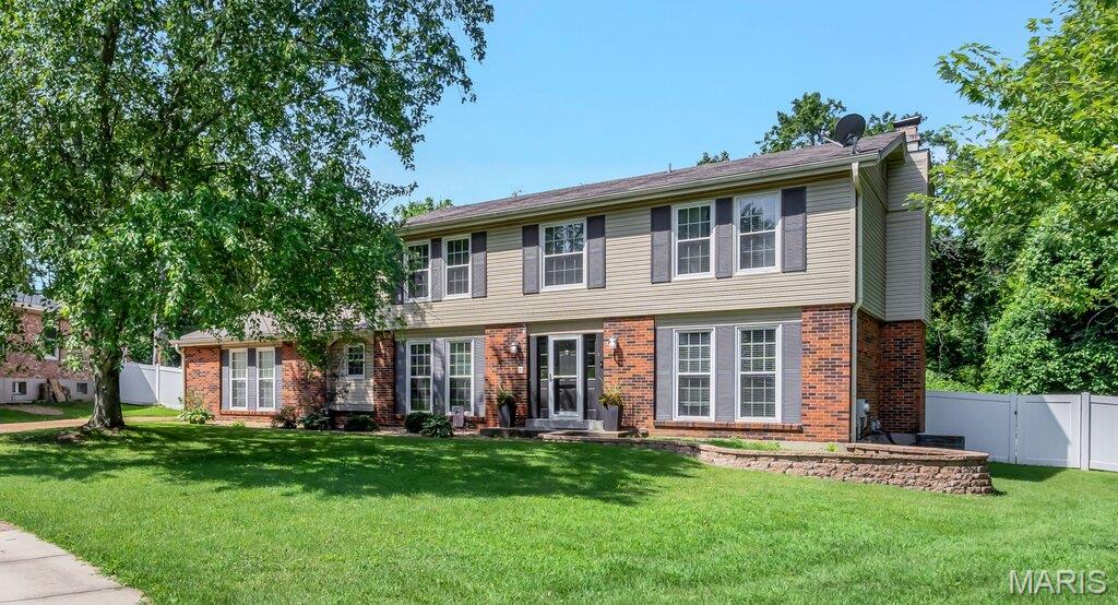 Don't miss this incredible opportunity to own this spacious 2-story home in the highly desirable Brass Lantern community! Offering 4 bedrooms, 4 bathrooms, a rear-entry 2-car garage, and over 3,000 square feet of living space, this home is ideally situated on a premium cul-de-sac lot backing to wooded common ground for added privacy. Conveniently located near major highways, shopping, and dining, it combines comfort with an exceptional location. The kitchen is equipped with stainless steel appliances, including an electric double convection oven (2024), dishwasher (2023), and microwave (2026). The inviting family room features a cozy wood-burning fireplace, wet bar, and a beautiful bay window that fills the space with abundant natural light. The main level also includes a private office, ideal for working from home, along with a separate formal dining room. The spacious primary suite offers a walk-in closet, granite vanity, and a beautifully tiled walk-in shower. Generously sized secondary bedrooms provide plenty of space for family or guests. The finished lower level is perfect for entertaining and includes a large recreation area, gaming space, and a full bathroom. Additional highlights include zoned heating and cooling for enhanced comfort and efficiency. Step outside to enjoy the vinyl-fenced backyard featuring an oversized concrete patio and a fire pit—an ideal setting for entertaining family and friends. This exceptional home offers the perfect combination of space, functionality, and a sought-after location.