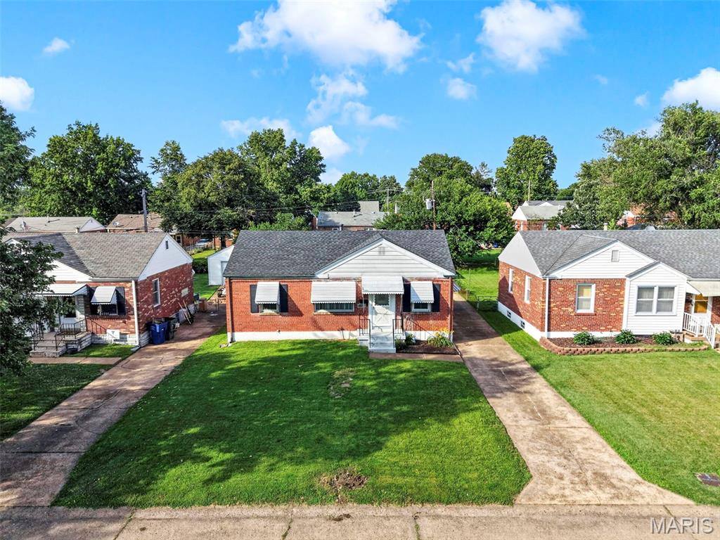 Open SUNDAY 1-3 pm! Get ready to be dazzled by this radiant home at 4317 Sunshine Drive! Step inside to find gleaming hardwood floors that flow beautifully throughout the main level. The luminous living and dining spaces open directly into a bright kitchen, complete with sleek stainless steel appliances. Both main-level bedrooms feature ceiling fans for your comfort, accompanied by a refreshed full bathroom boasting updated modern fixtures.

Head downstairs to discover even more space to shine! The lower level offers an expansive, carpeted recreation room providing endless possibilities for a media area, home gym, or entertainment zone. A second, fully updated full bathroom on this level adds incredible convenience to the home. Updates to the home include new AC (2023), adding blow-in fiberglass insulation (2022), replaced sewer lateral (2025). 

Ready to soak up the sun? The backyard is a brilliant private oasis. Relax, grill, and entertain on the great patio, completely enclosed by a brand-new wood privacy fence. Parking and storage are a breeze with your detached one-car garage and private driveway.

Location is everything, and this home beams with it! You are perfectly situated just moments from the beautiful scenery and trails of Carondelet Park. The 180-acre lush oasis of Carondelet Park—perfect for a morning run on the paved loop, a game of pickleball, or relaxing by the historic boathouse. You'll get to enjoy the summer concert series, plus can find yoga in the park and more. Craving a bite after exploring? The vibrant two-story patio and fantastic margaritas at local favorite La Catrina are just around the corner. Plus, daily conveniences are an absolute breeze with Loughborough Commons nearby, with Schnucks, Lowes, and St. Louis Bread Co to name a few spots.