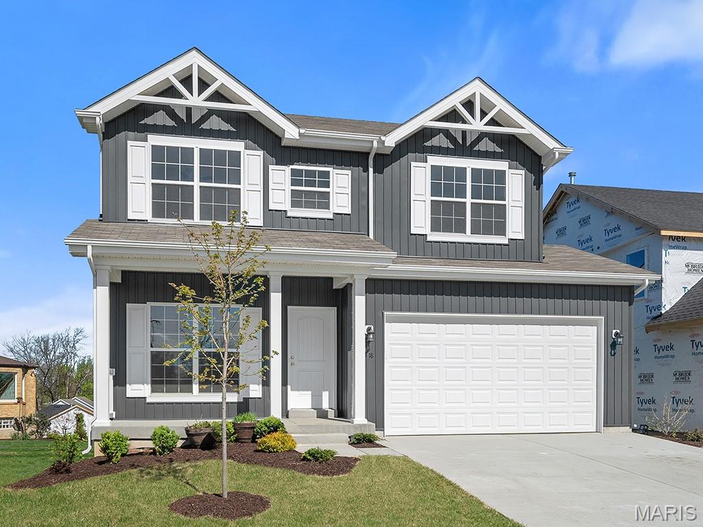 New McBride Homes Sterling 4BR 2.5BA will be ready this summer! Farmhouse exterior! Great for gatherings, the main floor has wood laminate flooring & 6’ windows. Off the foyer, a living room or home office space leads into a family room, extended kitchen, & powder room. The kitchen has a center island w/extended top, quartz countertops, Benton Sarsaparilla 42” cabinets, walkin pantry, & stainless GE appliances. The dining area has a sliding glass door to the backyard. Upstairs the primary suite has a walkin closet, private bath w/walkin shower, double sinks & linen closet. 3 extra bedrooms, full bath & laundry area add convenience. Extras include 2 panel white interior doors, upgraded fixtures & ¾ bath rough-in at LL. Deer Meadows offers beautiful new homes in Sullivan, MO with convenient access to I-44, shopping, dining, and outdoor recreation in Franklin County. Enjoy peace of mind with McBride Homes’ 10 year builders warranty & incredible customer service! Similar photos shown.
