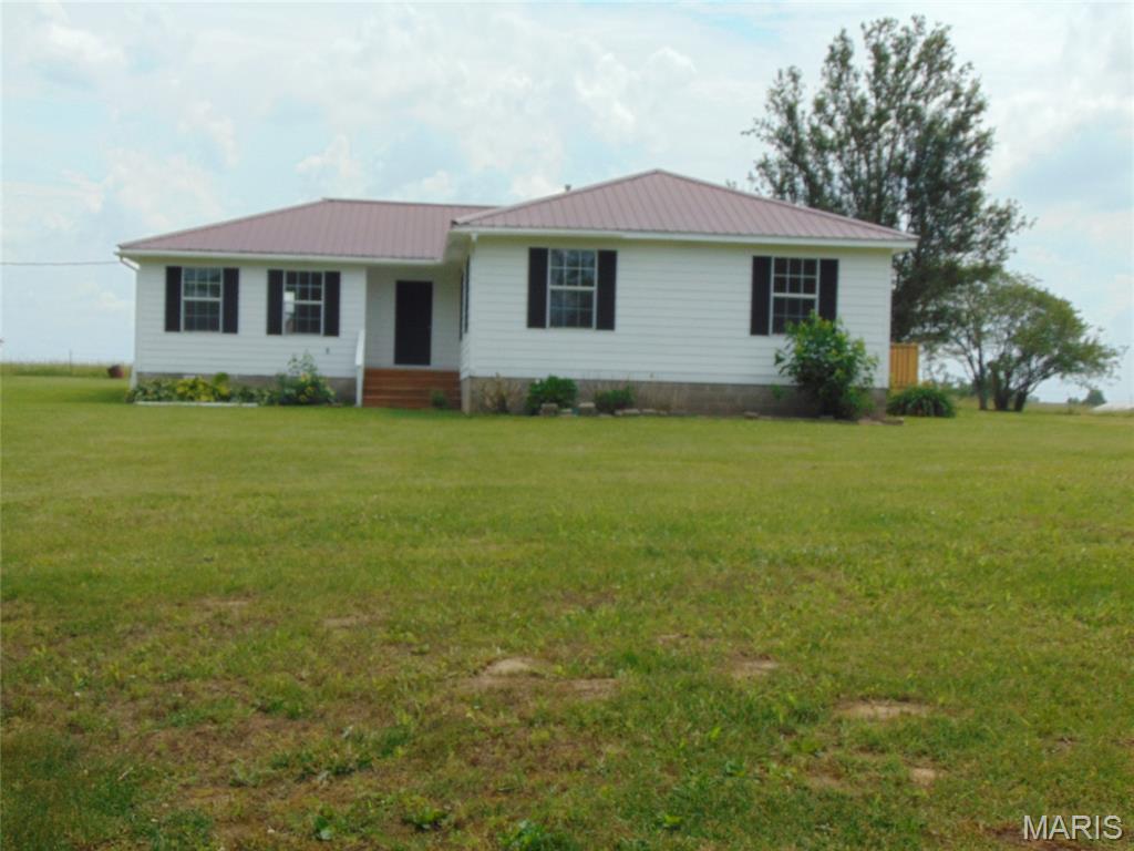 Just remodeled and super sharp! This 4 bed, 2 bath home (plus an office!) looks brand new all the way around. Built in 2000, it sits on 1.3 acres m/l out in the country between Doniphan and Poplar Bluff. Fantastic large, new deck overlooking the adjoining field. Storage shed in the back that needs some repairs but will be very convenient. Look at the pics of this home and call for your appointment to see it in person.