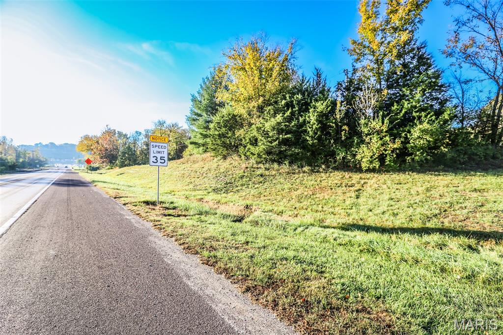 Public water, Public sewer & Electric are on the lot, making development straightforward and cost-effective. Fantastic Commercial Opportunity! Take advantage of nearly 400 feet of prime highway frontage with this level lot, perfectly positioned for maximum visibility and convenience. Zoned NC-1 (Neighborhood Commercial), this property offers incredible potential for a wide range of business uses. Located just a short walk from the high-traffic intersection of Hwy 30 and Hwy W, this site ensures excellent exposure and accessibility. Whether you’re looking to establish, expand, or relocate your business, this property’s unbeatable highway/interstate frontage makes it a must-see. Property is vacant land and being sold as-is.