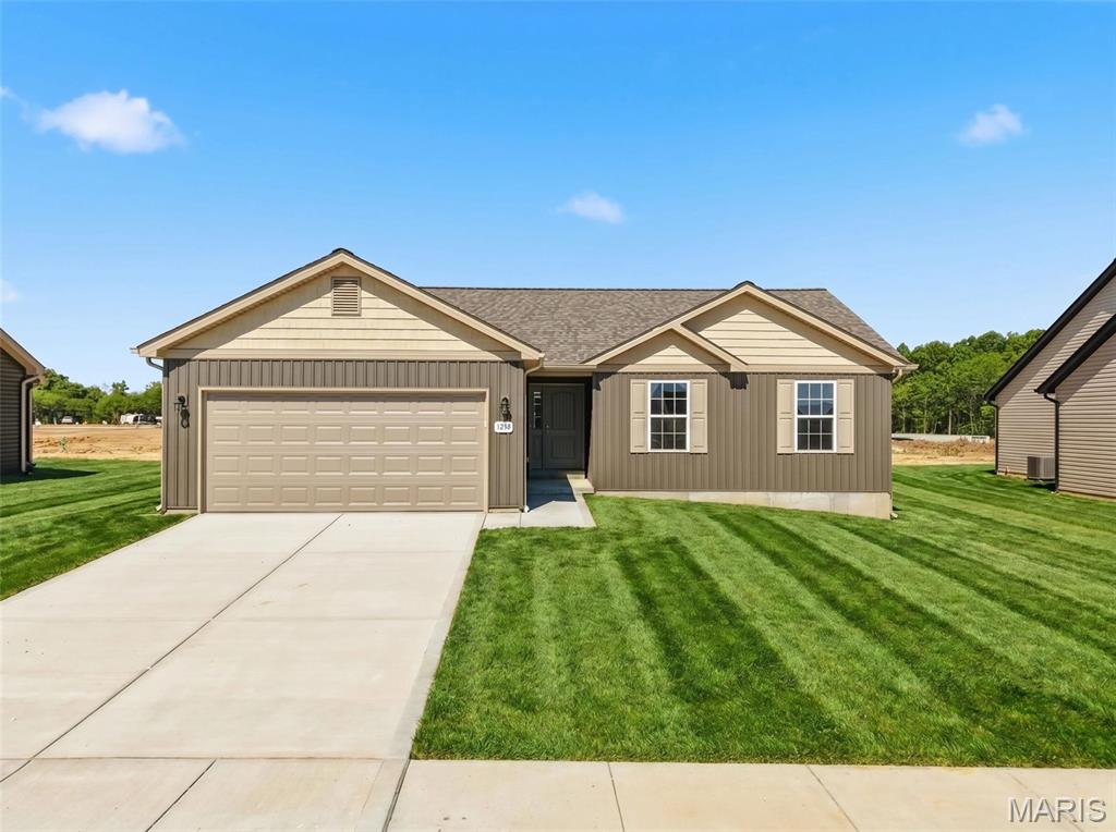 Inventory Home! USDA No Money Down Territory! New Construction! Move in Ready! The Bluffwood B Model Boasts 3Bed/2Bath Open Floor plan. Enter in the Foyer to the Great Room with Vaulted Ceilings W/Ceiling Fan. In the Kitchen you will find White Shaker Cabinets, Pantry, Stainless Steel Appliances and Recessed Lighting. The Master Suite includes a Walk-In Closet, Ceiling Fan, and an en-suite bathroom with a linen closet & a Step-In Shower. Other Interior Upgrades include Upgraded Flooring, Tilt-in Windows, 2 Panel Doors with Brushed Nickel Hardware and Brushed Nickel Light Fixtures. Full Basement W/ Egress Window, Sump-Pump, and Rough-In Bath. The Exterior includes full 2 Car Garage, Architectural Shingles, Maintenance-Free Vertical Vinyl Siding, Shake Siding in the Gables, Sodded Front yard & a Patio Included. Schedule your showing today!