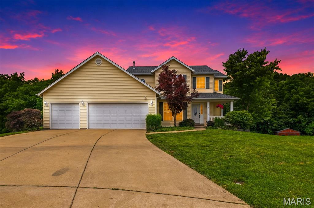 Welcome home to this spacious 2-story retreat, perfectly tucked away at the back of a quiet cul-de-sac and backed to trees for exceptional privacy. Designed for both everyday living and entertaining, the home features a bright, flowing floor plan with a dramatic 2-story entry, high ceilings, and functional "surprise" areas on every level! The updated kitchen offers granite countertops that wrap around to the breakfast bar, stainless steel appliances, and a bright breakfast room with access to the expansive deck overlooking the wooded backyard. The front flex room could be used as either a formal living or separate dining room, and the huge family room includes the added bay window wall along with a custom inset to give the focal point wall added character. Upstairs, the vaulted primary suite provides a peaceful escape with a walk-in closet and private bath, while additional bedrooms offer plenty of space for your growing family. The finished walk-out lower level expands your living space with a large family room, recreation area, and includes an additional bedroom and full bath. Car enthusiasts, hobbyists, or DIYers will appreciate the oversized 3-car garage with tandem space and the additional 14x16 room that can be used as a workshop or personal gym. With the beautiful covered front porch, updated finishes, abundant natural light, fencing, covered "storage" in the backyard and private setting, this home truly has room for everyone - human or animal alike! :)