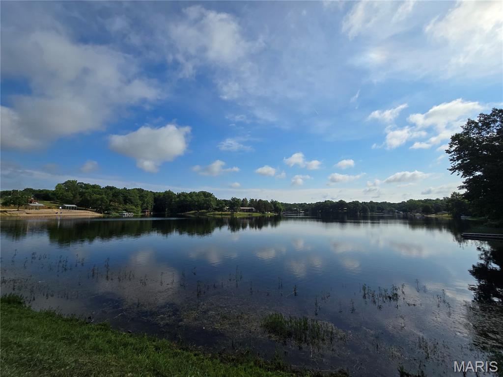 Renters have moved out and the seller prefers to sell instead of replacing carpet, painting and fixing drywall.  This is the chance you've have been waiting for! BUILD INSTANT EQUITY! Opportunity is knocking in Lake Timberline! Less than a mile from the lake, your spacious 1,800+ sq ft home is situated on approx .6 acres with a fenced in back yard, in a gated lake community and is ready for all of those Pinterest ideas you have been saving - giving you the opportunity to make this home your very own and presenting a rare chance to purchase well below the cost of many comparable homes in the area! This home offers tremendous potential for a buyer looking to add their own personal touches and build equity! Land, generous living space and a desirable community make Walnut Lane a rare find at this price point! The property is being sold as-is. Some personal items will remain with the home after closing. Opportunities to purchase a home of this size and location at this price are increasingly rare - do not miss your chance to make it your very own! Bring your vision, customize to your taste and unlock the full potential of this amazing home before it's too late!