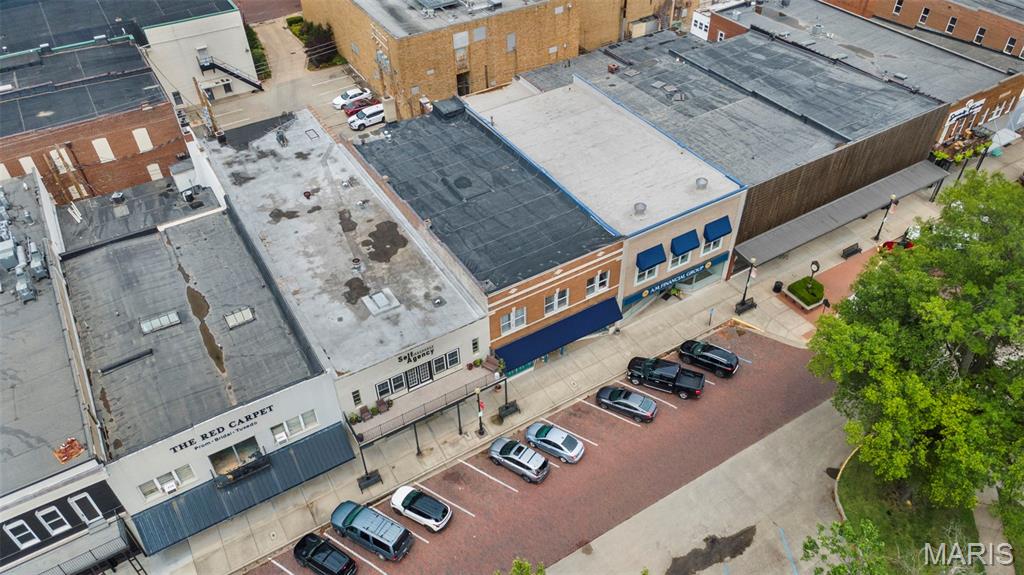 Take a look at this Historical Property with modern flair situated in a prime downtown location.  Enduring style and sophistication grace this beautiful 2 story, historic gem in the heart of downtown Sikeston. This is a rare and affordable buying opportunity for an investor or business owner looking for a high-visibility location with abundance of parking.  Originally built in 1915, this historic building is a notorious staple of Sikeston.  The stately high ceilings adorn both levels, and the ideas and uses are limited only to a ones imagination.  Most recent uses were an art studio, photography studio, and retail coffee shop.