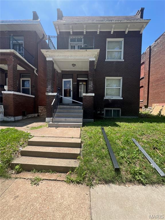Two family investment property to be sold "As Is". Duplex property needs updating before it is rental ready. Tons of potential. Lower unit one bedroom with bonus room commonly used as bedroom. Upper unit is a two bedroom. Market rent ranges $900-$1200. Solid brick property on upcoming quiet street (renovations have be observed on either side of property). Open to aggressive Seller Financing offers.