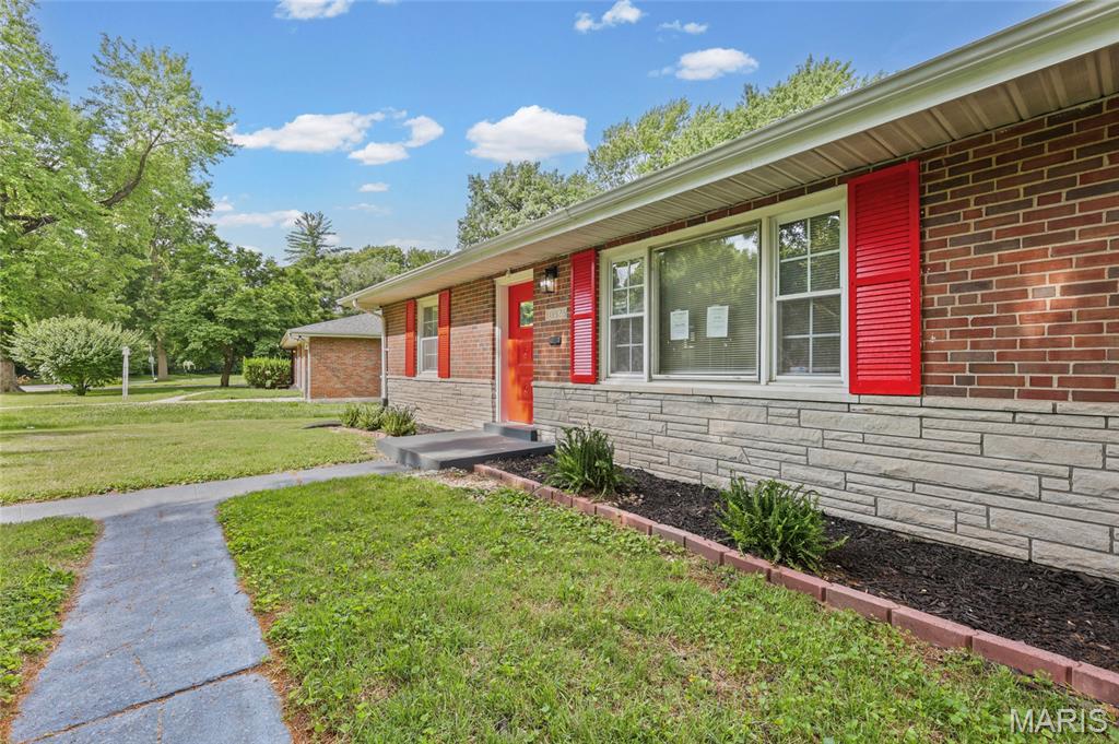 Don't miss this stunning ALL-BRICK home featuring 4 bedrooms, 2 full bathrooms, over 2,500+ square feet of living space, and nearly half an acre of outdoor space! Completely refreshed from top to bottom, this home offers the perfect blend of modern updates and timeless charm.

The show-stopping kitchen is a dream, featuring custom white cabinetry, gorgeous quartz countertops, stainless steel appliances, and an abundance of space for cooking, entertaining, and gathering. Throughout the home you'll find new luxury vinyl plank flooring, fresh paint, updated fixtures, and beautifully renovated bathrooms with stylish finishes.

With over 2,500 square feet of finished living space, there's room for everyone to spread out and enjoy. The fully finished walk-out lower level adds incredible versatility with additional bedrooms, a full bath, and a bonus room ideal for a home office, gym, media room, playroom, or guest space.

Step outside and enjoy the expansive backyard, complete with a fire pit and plenty of room for entertaining, gardening, pets, or simply relaxing. The oversized two-car garage and long driveway provide ample space for vehicles, storage, hobbies, and projects.

Homes with this much space, this many updates, and a lot this size are hard to find. Schedule your showing today and see everything this incredible property has to offer!