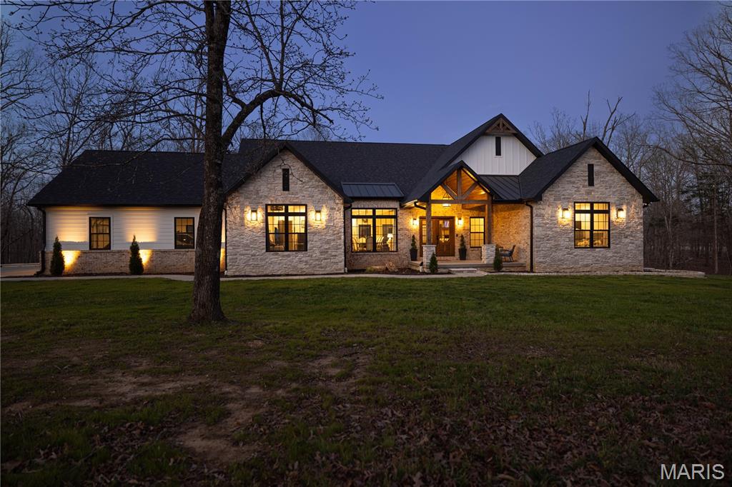 Completed in December 2023, this exceptional 7 bedroom, 4 bathroom home sits on approximately 5.9 acres within a private gated community, offering a rare combination of luxury, space, and quality craftsmanship. No expense was spared in construction, featuring premium LVP flooring throughout and LP SmartSide siding designed for lasting durability and low maintenance.

The thoughtfully designed kitchen showcases reinforced support beneath the island cabinetry and a large walk-in pantry conveniently located just off the kitchen, creating both beauty and functionality for everyday living and entertaining. The home also features a spacious laundry room, bricked mudroom for added durability, whole-home water softener, and a security system already in place. A true dream for remote workers with true fiber 1000 Mbps on both levels.

Built with long-term performance in mind, the foundation is protected with MEL-ROL waterproofing wrap, providing enhanced structural integrity and peace of mind. Outdoor living is just as impressive, with a beautiful main deck and porch perfect for relaxing or entertaining, along with an additional lower-level deck that expands your usable living space and offers scenic views of the surrounding acreage.

This property delivers the privacy of country living with the security of a gated community, all while showcasing the quality, space, and modern finishes today’s buyers are searching for. Schedule your showing today!