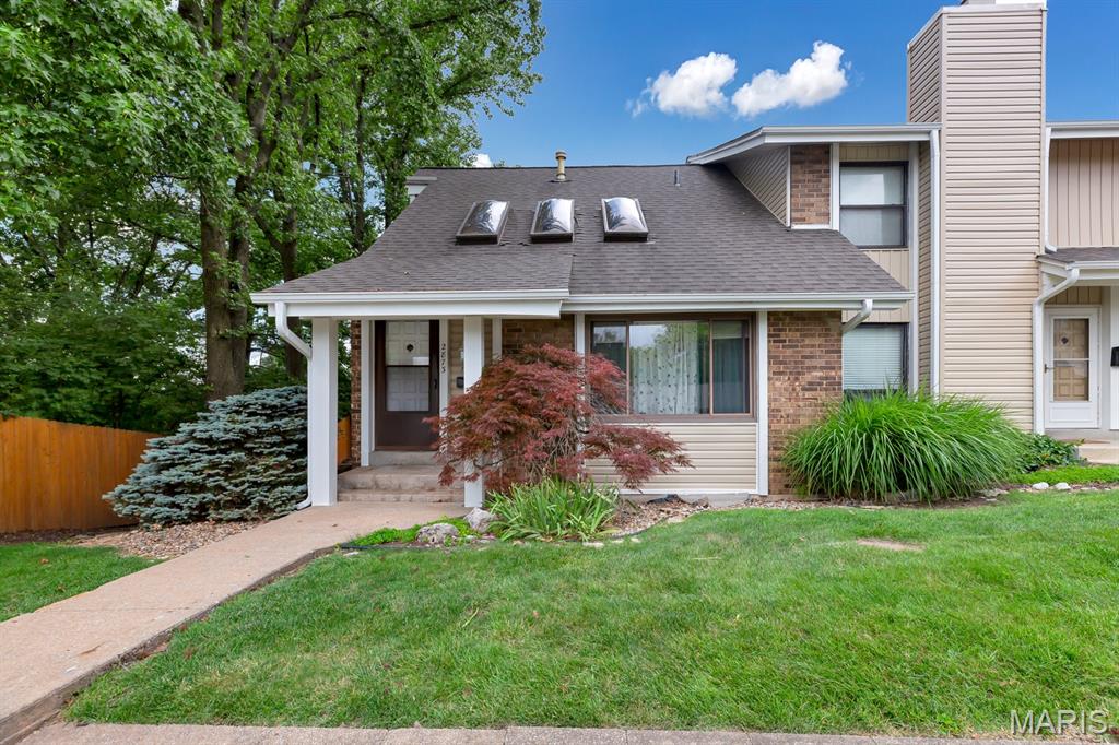 FINALLY! The nicest and most affordable townhouse, on a golf course, you will find. This end unit backs up to Hole 9 at the fabulous Bogey Hills Country Club. Enjoy the most perfect view of fairways, greens, lakes and a lit waterfall to keep you entertained after the sun sets behind it. Fully updated unit with solid surface countertops in the kitchen and newer appliances. This completely unique unit features a main level bedroom that looks over the large deck and scenic view. 2 big bedrooms on the Upper Level enjoy the view and feature a full, updated bath. The Family Room is beaming with natural light from 3 sky lights and large horizontal sliding windows. Being an end unit, this one has garden windows on the Main and Upper Level too. The Lower Level is finished with a bar area, large egress windows and features a half bath and laundry. The coveted garage space really "brings this one HOME" and provides that luxury feel. Practice your best golf clap and schedule a showing before this "hole in one" is gone! It is sure to be at the top of everyone's leaderboard.