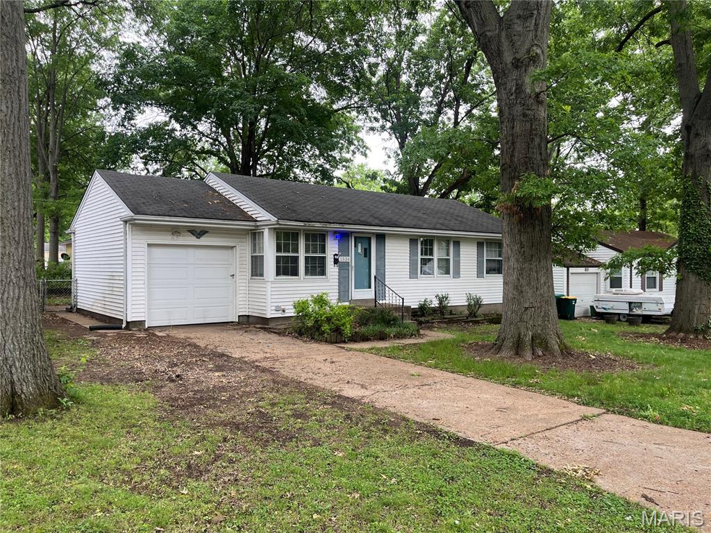 2 bed 1 bath home ready for a new owner!  Close to main streets, this home features a full basement and an attached garage!