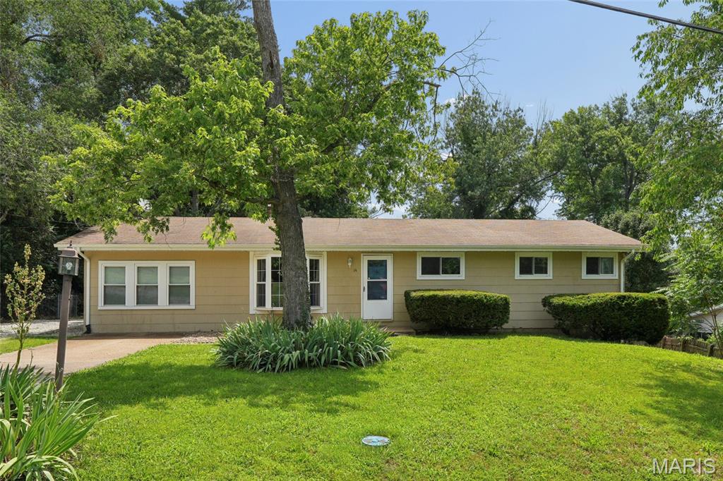 Welcome home to this charming 3-bedroom, 1-bath residence offering 1,344 square feet of comfortable living space on an expansive .57-acre lot. Inside, you'll find a warm, freshly painted and inviting layout with plenty of room to relax and entertain. The partially finished walkout basement provides additional living space, storage, and a dedicated laundry area. Step outside and enjoy the oversized backyard, perfect for gatherings, gardening, pets, or simply enjoying the outdoors. The patio with pergola creates a wonderful space for relaxing summer evenings, while the detached garage provides additional parking, storage, or workshop potential. With its generous lot size, functional floor plan, and desirable outdoor amenities, this property offers the perfect blend of comfort, convenience, and room to grow. Don't miss your opportunity to make this wonderful home your own!