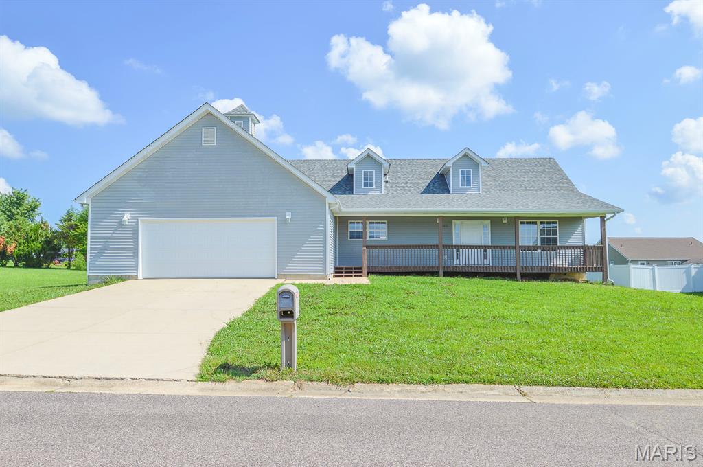 Price listed is Starting Bid Only. Bidding starts closing 8/13/2026 @ 5 p.m. Welcome home to this spacious three-bedroom, two-bath ranch nestled on a large cul-de-sac lot in the desirable Deer Meadows Subdivision of Sullivan, Missouri. Offering a functional floor plan, generous living spaces, and room to grow, this home is perfectly situated near local amenities with convenient access to I-44. Step inside to find a sprawling living room highlighted by vaulted ceilings, an overhead skylight, and large windows that fill the space with natural light. The kitchen features ample cabinet and countertop space, and tile flooring, providing plenty of room for meal preparation and storage. The private primary suite offers a relaxing retreat with a full bath featuring a large soaking tub, a stand-alone shower, and a walk-in closet. On the opposite side of the home, two generously sized bedrooms share a conveniently located full bathroom. A laundry room provides direct access to the oversized attached two-car garage, while the full unfinished basement offers exceptional storage and presents an excellent opportunity to expand the home's living space to suit your needs. Outside, a covered front porch or host family and friends on the deck overlooking the back yard. With its desirable location, spacious layout, and untapped potential, this Deer Meadows home is ready to welcome its next owner.  Property will sell under auction terms and be sold AS- IS, WHERE-IS. Seller, will not make any repairs as a result of any building, occupancy, or environmental inspections. Buyer will be required to sign an Auction Purchase & Sale Agreement if final bid is accepted by Sellers.