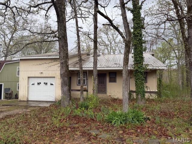Spacious 3 bedroom 2 bath home offering 2272 +/- sq ft. and endless potential! Featuring soaring ceilings, 2 fireplaces and a unique multi-level layout, this property is ready for your vision. Situated on a shaded lot with trees and an attached garage, this home is ideal for investors, flippers, or buyers looking to customize and build equity. Don't miss the opportunity to transform this property into something special!