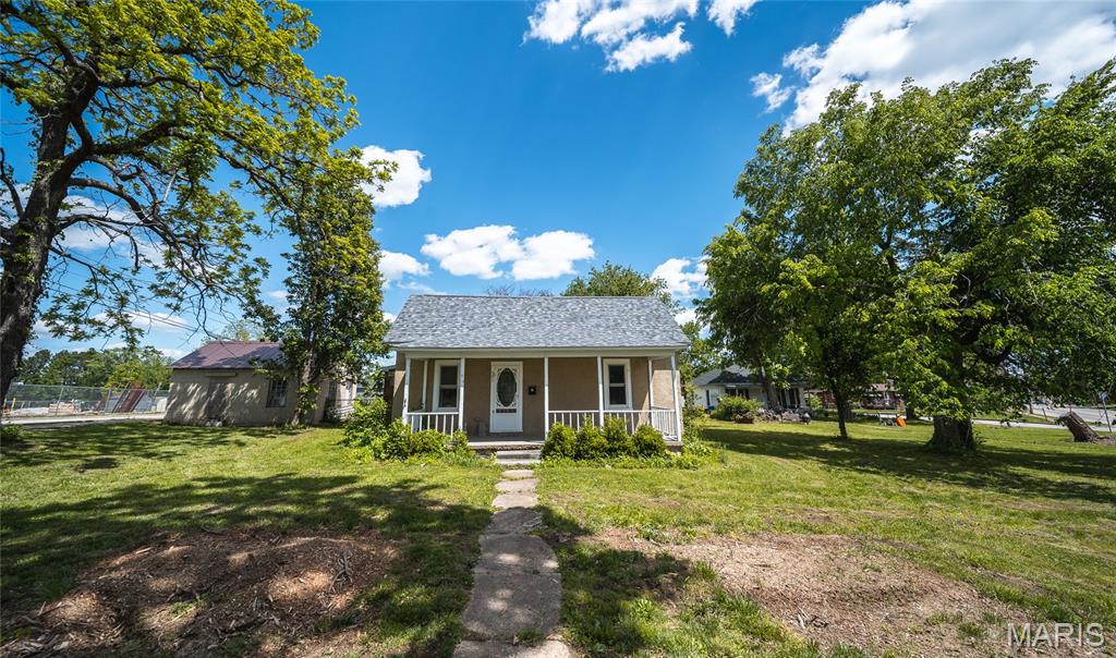 Turnkey & Move-In Ready in the Heart of Rolla! Don’t miss this charming 2-bedroom, 1-bath home perfectly situated right in the heart of Rolla. Set on a spacious 0.64-acre double lot, this property offers plenty of room to enjoy, complete with a fenced backyard—ideal for kids, pets, or entertaining.
This home is packed with updates, including a new roof, windows, and doors, along with fresh paint and new flooring that beautifully complement the original hardwood floors throughout. The bathroom has been fully remodeled, and the home also features a versatile laundry room/sunroom/mudroom space. Outside, you’ll find two bonus storage sheds, one with a brand-new metal roof, perfect for hobbies, storage, or workspace needs. A new commercial-grade water heater, sump pump and new fencing add even more value and peace of mind. Conveniently located near shopping, dining, and everyday essentials—with some within walking distance—this home blends comfort, convenience, and charm.
Bonus: The seller is offering the option to purchase the home without the additional lot at a reduced price, giving you flexibility to fit your needs.