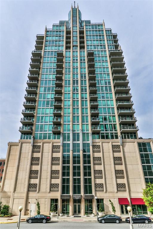 Welcome to 1401, sophisticated living at its finest  Step into breathtaking views with floor to ceiling windows on the 14th floor of the Park East Tower.  The generous size offers an open floor plan that flows throughout the unit boasting 4 bedrooms and 3 full bathrooms.  The primary bedroom suite has amazing views with a balcony, 2 custom walk in closets, and a full bath with separate tub and shower.  The other 3 bedrooms are generous in size and also offer ample closet space.  The living room has sliding glass doors leading to a large balcony, a fireplace and overlooks the kitchen.  The kitchen offers custom cabinets, plenty of counter space, and a large center island with ample seating.  The separate dining room combined with the great room has a wet bar, fireplace and small balcony. The unit is further enhanced for entertaining with a walk in wine cellar and extra storage room.  In addition there are 2 parking spots, extra storage and many amenities within the building. Location: City, Corner Location, Upper Level