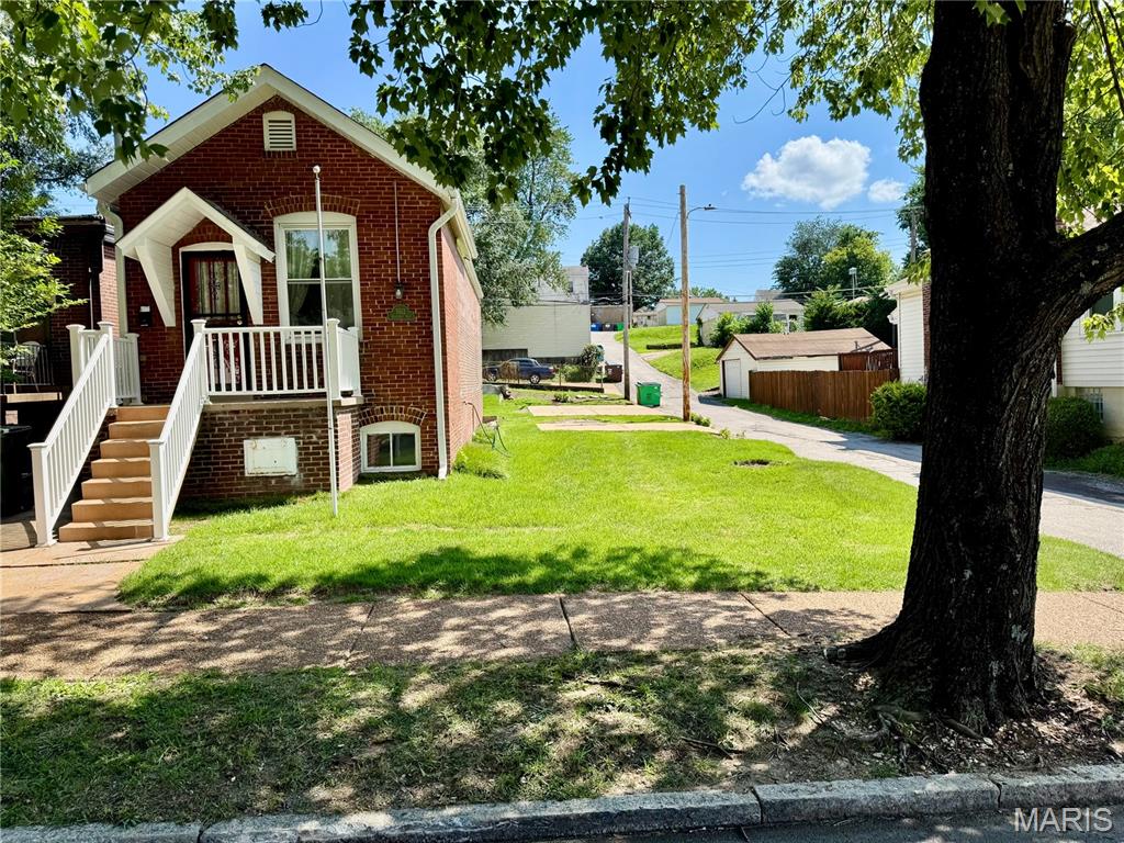 Well maintained "Shot gun" home located on The Hill. It is on a Double Lot. So much flexibility, expand exiting home, build on vacant lot, knock down & build a bigger home or use as an Airbnb. Located by an alley & has 2 off street parking pads. Big Eat in Kitchen. Nice Russian Acacia Wood floors. Thermal Windows. Great location. Walk to Restaurants, Coffee shops, Bars, Grocery Everything The Hill has to offer. Property is being sold in "As is" condition. It has already been approved by the City for an Occupancy Permit. Come on by & see for yourself. Open this Sunday 1-4.