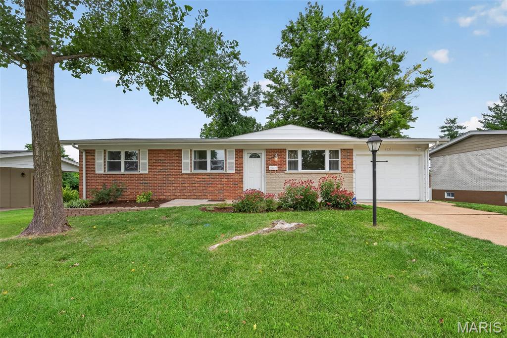 Charming 3-bedroom, 2-bath ranch home in desirable South County! This move-in-ready home has been freshly painted and features luxury vinyl plank flooring(2024) throughout the living room, kitchen, bedrooms, and finished lower-level recreation room.
The main level offers an inviting eat-in kitchen with white cabinetry, stainless steel appliances, and convenient access to the attached one-car garage. The finished lower level includes a spacious recreation room with a walkout to the backyard patio, a large laundry room complete with a utility sink, countertop workspace and white cabinets as well as  a room that can be used as an office or workout room and two more storage rooms! New HVAC system and Water Heater in 2025.  Enjoy family gatherings or quiet time on the large deck overlooking the ample sized peaceful and quiet backyard with a garden and shed that backs to trees.  Conveniently located near the Gravois Greenway and Grant's Trail walking and biking trails and a close drive to Grants Farm, 9 mile Garden and Lemay Plaza. Showings start Friday Morning and professional photos to be added soon!