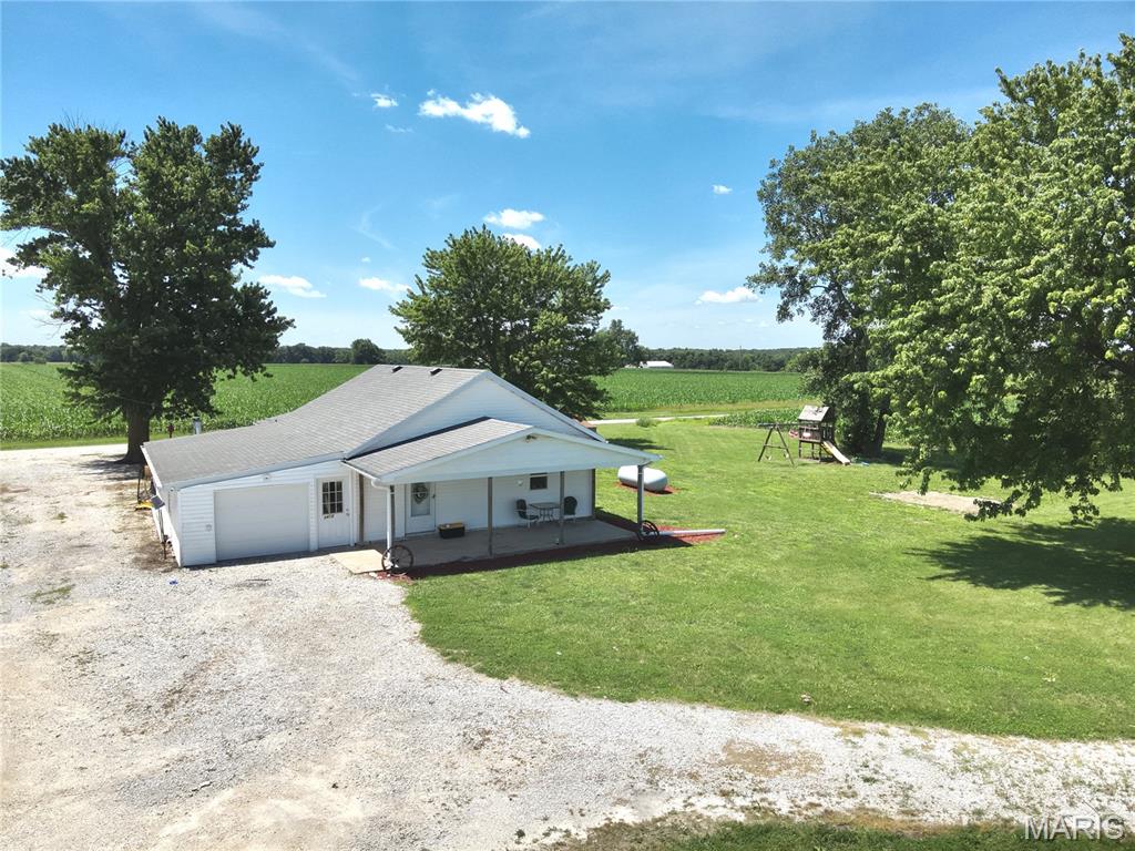 Escape the noise and enjoy the peace of rural Missouri at 3412 Highway 168, Palmyra, MO. Nestled in the countryside, this charming 3-bedroom, 1-bath home offers the perfect blend of comfort, simplicity, and country charm.
Start your mornings with a cup of coffee on the inviting covered front porch and unwind in the evenings on the  rear porch while taking in the quiet views and fresh country air. Inside, you’ll find a comfortable layout with spacious living areas, making this home ideal for first-time buyers, downsizers, or anyone looking to enjoy a slower pace of life.
Whether you’re looking for a place to raise a family, enjoy retirement, or simply escape the hustle and bustle, this property offers the opportunity to make country living a reality.
Don’t miss your chance to own a slice of Northeast Missouri countryside—schedule your private showing today!