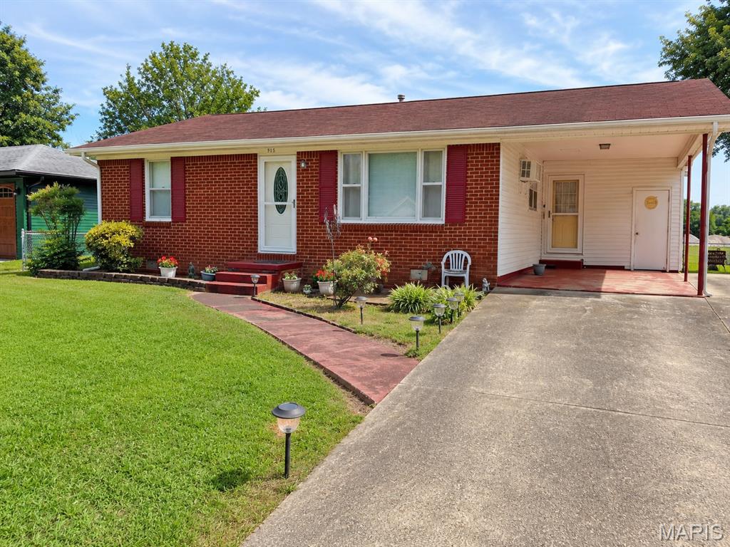 Welcome home to this beautifully maintained 3-bedroom, 1.5-bath residence offering nice curb appeal and comfortable living. The attractive brick & vinyl exterior is complemented by nice landscaping & a welcoming sidewalk leading to a decorative etched glass front door with a new full view storm door. A second new full view storm door is located at the carport entrance. Inside, you'll find numerous updates, including wood-tone vinyl flooring, fresh paint, ceiling fans, and a remodeled full bath with new vanity, vinyl flooring, & commode. The kitchen comes equipped with range, refrigerator, & attractive backsplash.  The utility room is conveniently located just steps away. 
Outside, enjoy a chain-link fenced backyard with 2 storage buildings. An attached carport plus an additional parking pad provides plenty of room for vehicles & guests.