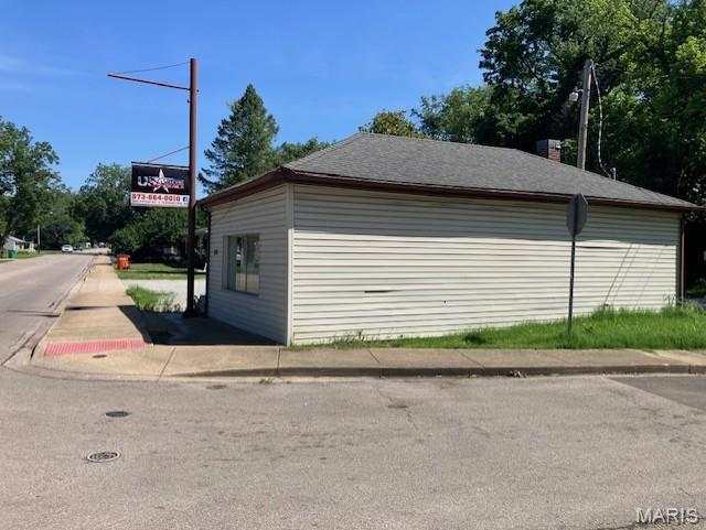 Buy for your own use, or make it an affordable addition to your business holdings. 
This commercial building has been occupied for most of the roughly 35 years the seller has owned it. It has been a steady source of passive income.
Use it as is with some touch up, or build it out inside to fit your needs. In the past it has housed an insurance office, psychology services provider, small retailers, a video rental retailer, and most recently a smoke shop. Other possible uses for the C3 commercial zoning might a beauty shop, barber shop, retail business, coffee shop, computer services provider, etc.! 
It is a great location. The building fronts Potosi Street ... one of the highest traffic streets in Farmington. And West College Street runs along one side. There is an entrance to the parking area from both streets.
There is a large front office/retail space that is 20X17 feet. A 12X10 back room could serve as another office space or storage. And there's a restroom at the end of the hallway. 
The building could use some cosmetic touches, but all the utilities are in place. 
And there's plenty of off-street parking. 
Like the location, but the building doesn't suit your needs? For this price you can buy it and demolish the building and build what you need.
Commercial space with this much visibility and traffic at this price is a rare find.