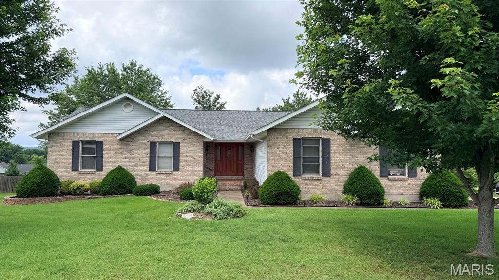 Move-in ready and located in a well-established subdivision, this beautiful 3 bedroom, 2 bath home offers comfort, space, and functionality throughout! Step inside to find a spacious living room, along with a cozy family room featuring a gas fireplace and direct access to the deck. The sunroom provides an additional inviting space filled with natural light. The kitchen is designed with convenience in mind, offering a center island, breakfast bar, and plenty of workspace. The main floor laundry adds everyday convenience. The primary suite features a walk-in shower, separate soaking tub, and ample space to unwind. Two additional bedrooms and a full bath complete the main level. Downstairs, the unfinished walk-out basement is already plumbed for a third bathroom and offers excellent storage or the opportunity to finish the space to fit your needs. Outside, you’ll appreciate the well-landscaped yard and attractive curb appeal. This home is ready for its next owner to move right in and enjoy!