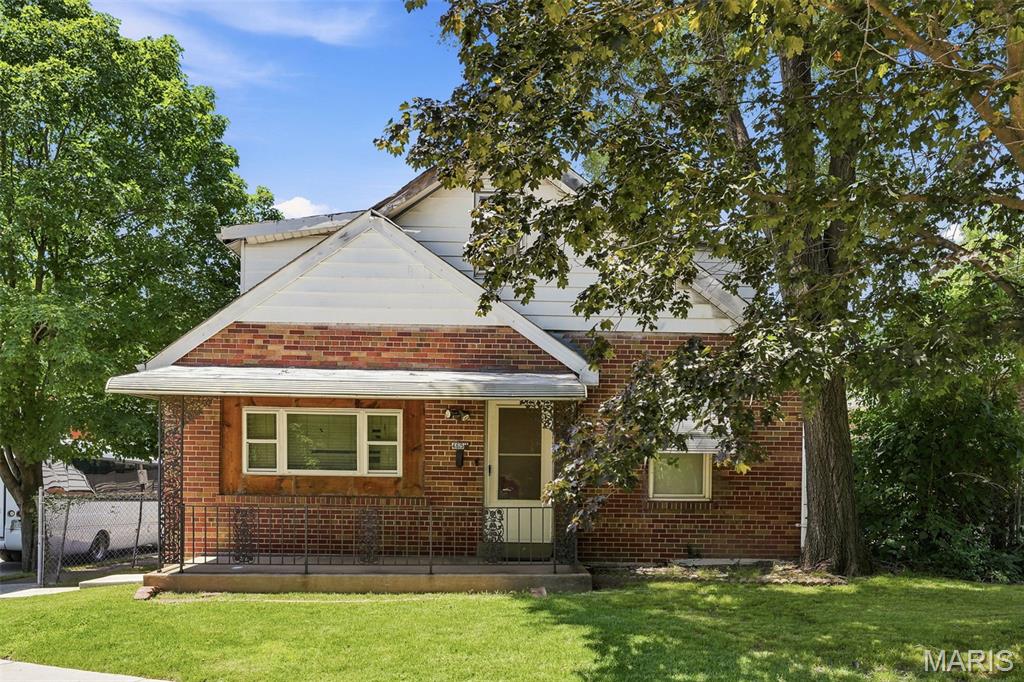 Opportunity awaits with this spacious South St. Louis home situated on a corner lot with convenient access to I-55, making for an easy commute to Downtown St. Louis, South County, and major employment centers. The main level features a living area, 2 bedrooms, and a full bathroom. Upstairs offers 2 additional bedrooms plus a bonus room, providing flexible space for a home office, playroom, or additional storage.
The finished lower level includes additional living space, a private room, and a full bathroom. Outside, you'll find a large detached 3-car garage and plenty of yard space.
Currently tenant occupied. Property is being sold as-is. With some updates and renovations, this property offers excellent potential for investors or owner-occupants looking to add value.