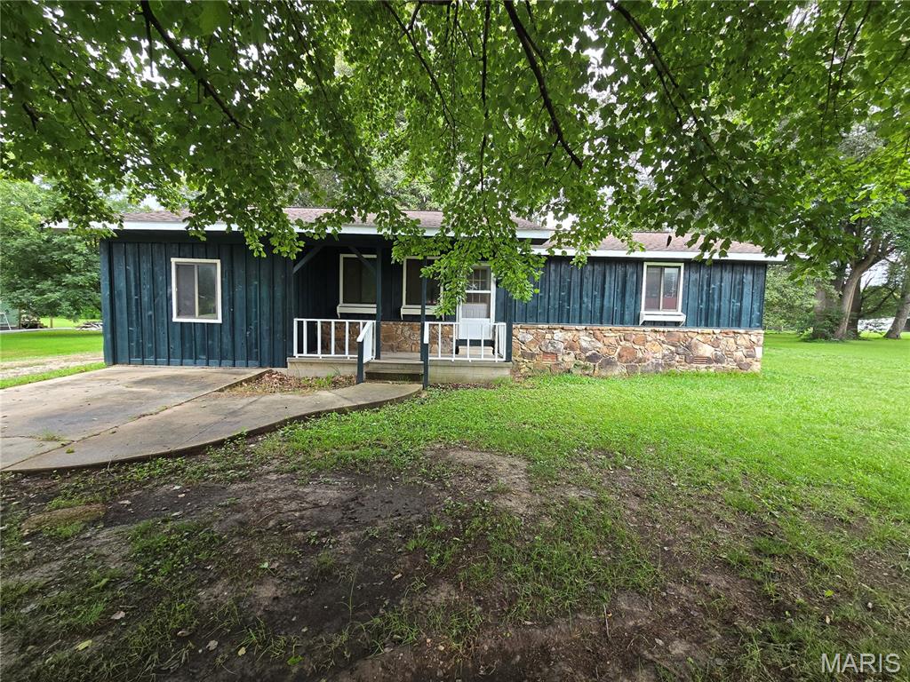 Welcome home to this well-maintained 3-bedroom, 1.75-bath home offering the flexibility today's buyers are looking for! Situated on a ½-acre lot, this property features an additional oversized room that can easily serve as a 4th bedroom, family room, game room, home office, or playroom—the choice is yours.

Inside, you'll find fresh paint, new flooring, and updated ceiling fans, giving the home a clean, move-in-ready feel. The spacious kitchen offers plenty of cabinet and counter space, while the comfortable living areas provide room for everyone to spread out.

Outside, enjoy the shade of mature trees, a covered front porch, large yard, and plenty of space for entertaining, gardening, or simply relaxing. The detached storage building adds extra space for tools, lawn equipment, or hobbies.

Built in 1990, this home combines functional living space with recent updates, making it a great option for first-time buyers, growing families, or anyone looking for extra room to fit their lifestyle.