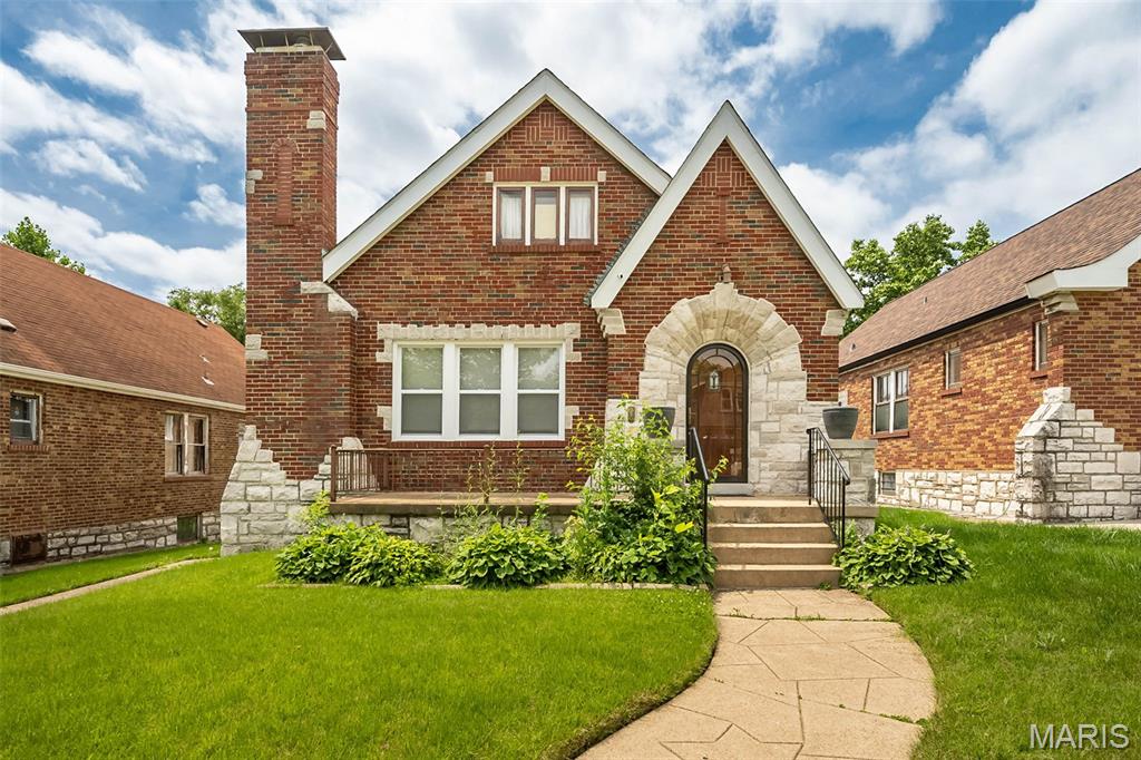 Beautifully maintained all-brick English Tudor showcasing the craftsmanship and character that make these homes so sought after. Owned and lovingly cared for by the same owner for 45 years, this home offers an uncommon opportunity to own a property where many of the original architectural details remain intact and unpainted, including the one-panel doors, original wood trim, baseboards, and hardwood floors.

A welcoming entry foyer sets the tone for the home's timeless character. The main level features two bedrooms, a cedar hall closet, and a sunporch/mudroom overlooking the backyard. Upstairs, the finished attic provides a spacious family/recreation room along with a third room that could serve as a bedroom with the addition of a chifforobe or closet.

While the historic character has been carefully preserved, important updates have already been completed, including vinyl replacement windows on the first floor, updated electrical service, plumbing stack, and roof. Additional features include a walk-out basement, one-car garage, and low city taxes.

Conveniently located near parks, shopping, restaurants, schools, and other everyday amenities, this home combines historic charm with practical city living. Buyers will appreciate the exceptional condition, thoughtful maintenance, and original features that have survived generations without being covered up or altered.

Eligible buyers may qualify for up to $50,000 in down payment assistance. Contact me or your favorite agent for details on available programs and how you may be able to purchase this home with minimal out-of-pocket expense.