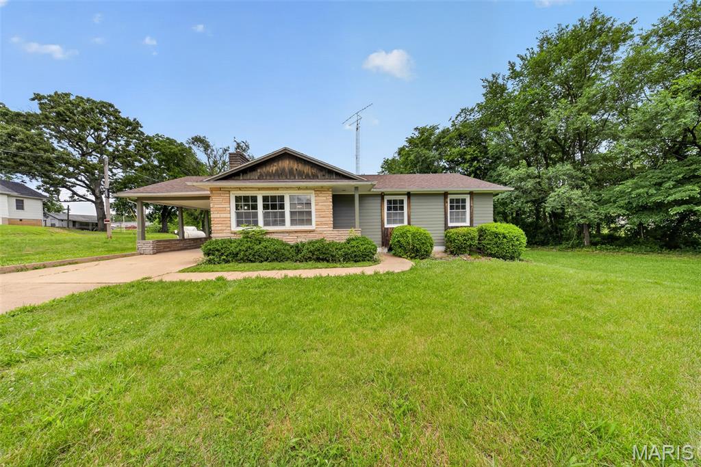 Charming and beautifully updated 3 bedroom, 1 bathroom home in the heart of Dixon! Situated on over half an acre and conveniently close to local amenities, this move-in ready property offers the perfect blend of character and modern updates. The inviting living room is filled with natural light and features a stunning stacked stone fireplace as its focal point. Wood flooring flows throughout the living room and bedrooms, while the kitchen and dining area showcase abundant cabinetry, new luxury vinyl plank flooring, a breakfast bar, and new appliances. The home also sits on a full walk-out basement with laundry hookups and plumbing for a half bath, offering excellent storage, workshop space, or future expansion potential. Don’t miss this opportunity to own a beautifully refreshed home in a convenient location! Schedule your private tour today!