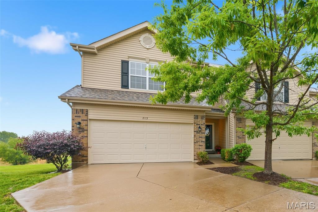 You will fall in love with this beautiful townhome, nestled away on a quiet cul-de-sac backing to Woodlands Sports Park in the heart of St. Peters! With over 2,000 SqFt of living area, this 3-bedroom, 4 bathroom (2 full, 2 half) home will impress the most discerning buyer. 

Upon entry, the inviting main level showcases durable wood veneer flooring throughout, and an open-concept layout designed for comfortable everyday living and entertaining alike. Spacious living room features an expansive boxed bay window allowing natural light to pour in, while the dining area opens seamlessly to the deck overlooking peaceful greenspace. The kitchen is sure to impress with rich mocha-finished maple cabinetry, stainless steel appliances, pantry storage, and a breakfast bar with comfortable seating for four. 

Upstairs, the spacious primary suite offers dual walk-in closets and a luxury bath complete with adult height, dual sink vanity, separate soaking tub, and shower. All bedrooms feature walk-in closets, providing exceptional storage throughout. Convenient second-floor laundry includes washer and dryer. The finished lower level adds living space with a recreation room, half bath, and ample storage area. Additional highlights include a 2-car garage and recent updates including new roof (2025), new HVAC (2023) & new dishwasher (2026). Move-in ready and ideally located near parks, shopping, dining, and major commuter routes! 

Schedule your private viewing today.