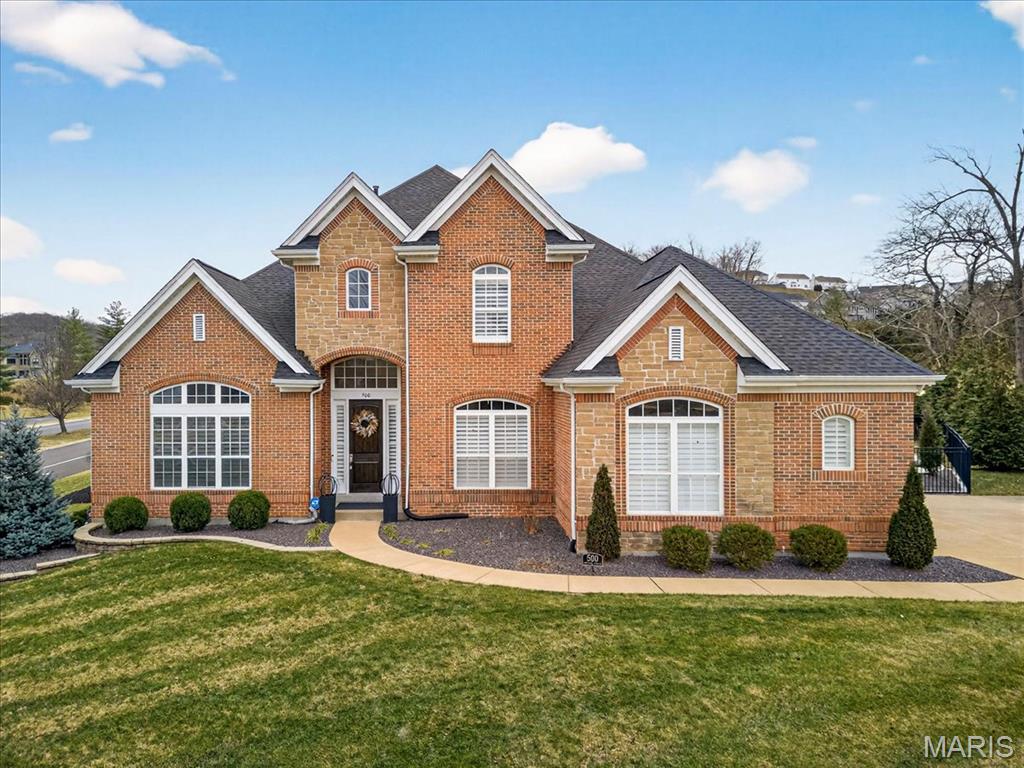 Welcome to this beautifully updated 4-bedroom home located in the highly desirable Overlook At The Legends subdivision. Walking up to this meticulously landscaped brick & stone front home, you will be awed by the wall of windows that greets you as you enter. The gorgeous, fully updated kitchen features custom cabinetry, Quartz countertops, Cafe appliances, custom backsplash, and spacious island. The main floor luxury primary suite is a true retreat, highlighted by a spa-like primary bath with soaking tub, dual vanities, and walk-in shower. Upstairs are two bedrooms with Jack & Jill bath, along with loft overlooking the great room. The finished lower level is complete with family/rec room, bar area, spacious bedroom, full bath, and office. Step outside to your private backyard oasis complete with a fabulous saltwater inground pool, creating the ultimate setting for summer fun and outdoor entertaining. Also new in the past two years are roof, both HVAC units, water heater, flooring, garage doors/motors/tracks, landscaping w/lighting, reconfigured irrigation system. With its location in the top-rated Rockwood schools, this home offers exceptional lifestyle and value in one of the area’s most sought-after neighborhoods.