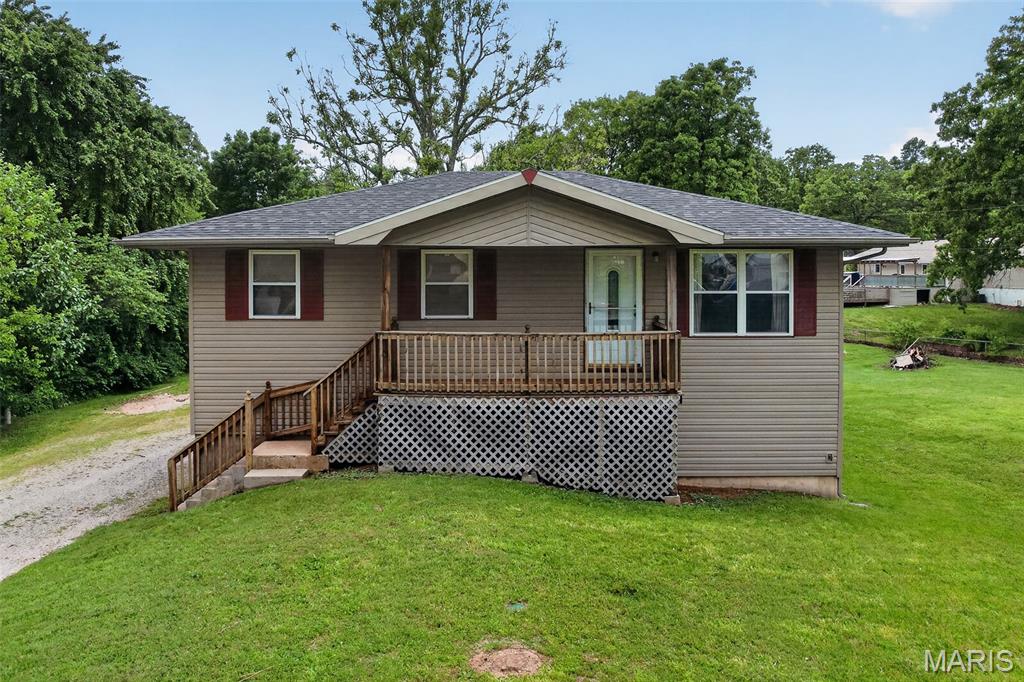 For the first time in 30 years, this well loved home is ready for it's next chapter. Sitting on 1.15 acre just outside of city limits, this property offers one of the most peaceful settings in the neighborhood. You'll plan your mornings around sitting on the back deck with a cup of coffee in hand, soaking in the quiet and nature. It offers 3 bedrooms, 1 bathroom and has been carefully maintained with all major systems replaced within the last 10 years. Inside you'll find a functional layout with a full basement featuring a fireplace and extra living area perfect for entertaining or a movie night in. The home has been well cared for, and now it’s ready for you to come in and update it to make it your own!