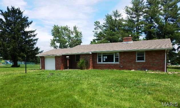 Ranch style, full brick home situated on 4.6 acres with an attached one car garage. The home has 3 bedrooms, 1 bath, 1296 square feet, some hardwood floors, and a full basement situated on  a fairly level lot.