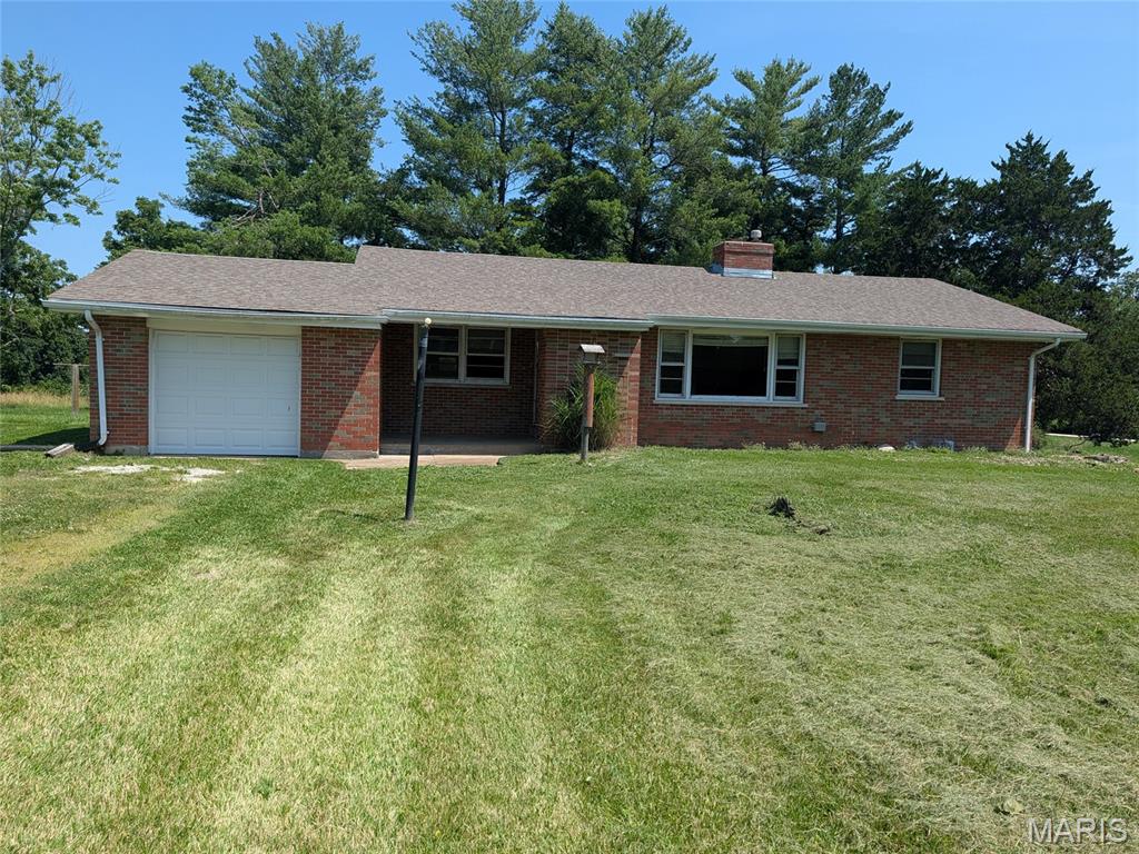 Ranch style, full brick home situated on 4.6 acres with an attached one car garage. The home has 3 bedrooms, 1 bath, 1296 square feet, some hardwood floors, and a full basement situated on  a fairly level lot.

Some photos are virtually staged.